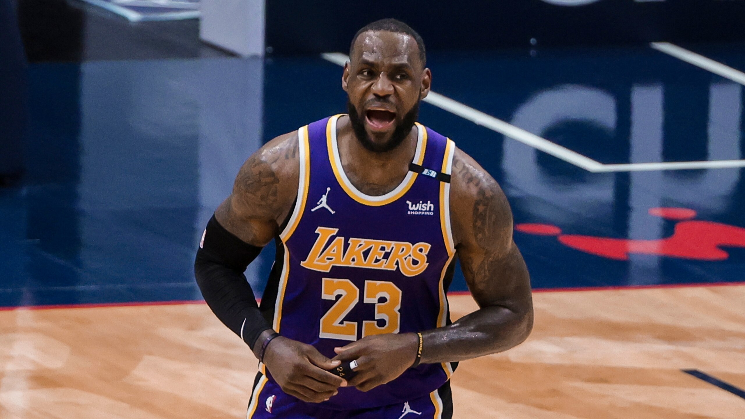 Los Angeles Lakers forward LeBron James (23) celebrates after scoring against the New Orleans Pelicans in the third quarter of an NBA basketball game in New Orleans, Sunday, May 16, 2021. (AP Photo/Derick Hingle)