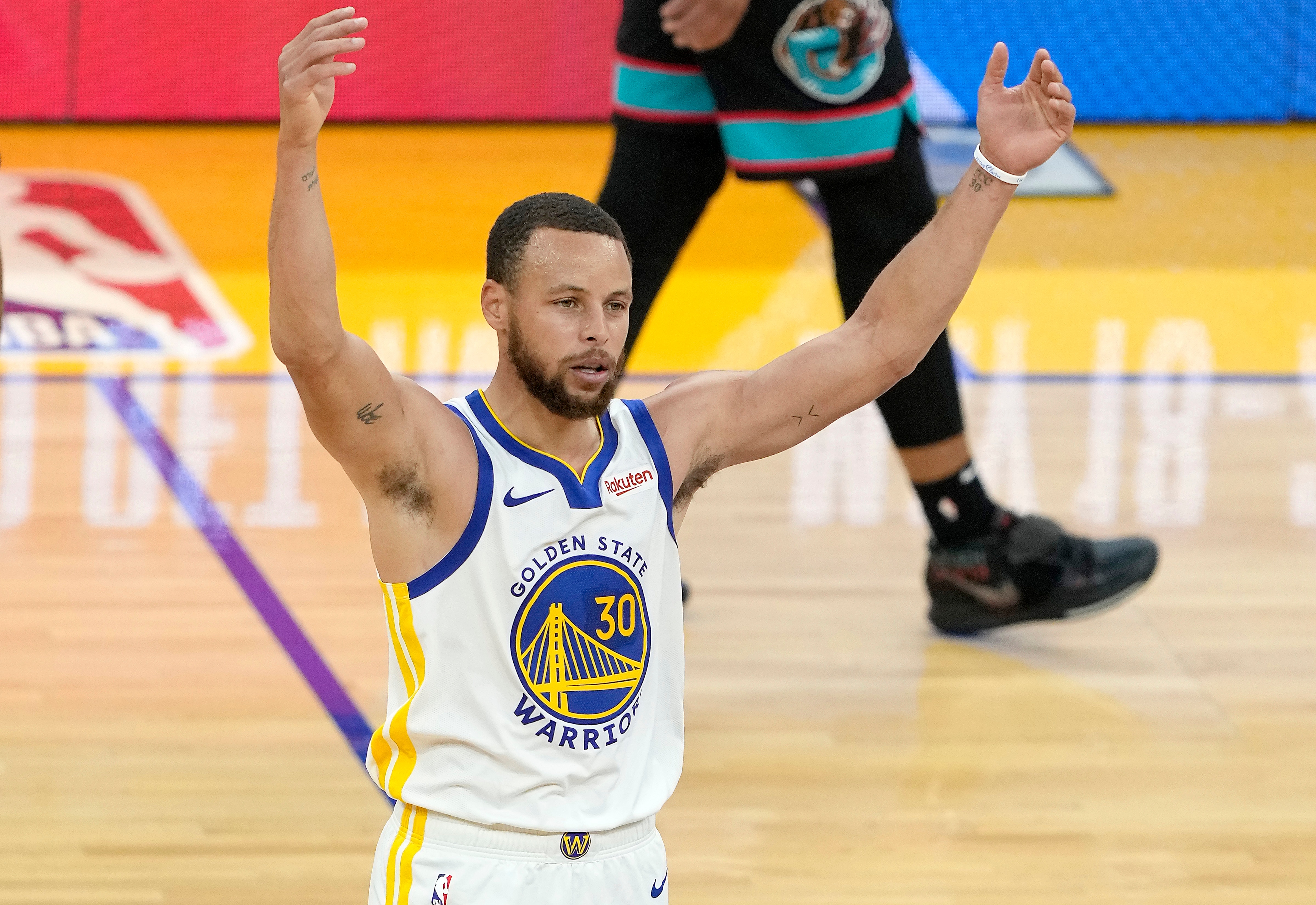 SAN FRANCISCO, CALIFORNIA - MAY 16: Stephen Curry #30 of the Golden State Warriors celebrates after shooting and making a three-point shot against the Memphis Grizzlies during the second half of an NBA basketball game at Chase Center on May 16, 2021 in San Francisco, California. NOTE TO USER: User expressly acknowledges and agrees that, by downloading and or using this photograph, User is consenting to the terms and conditions of the Getty Images License Agreement. (Photo by Thearon W. Henderson/Getty Images)