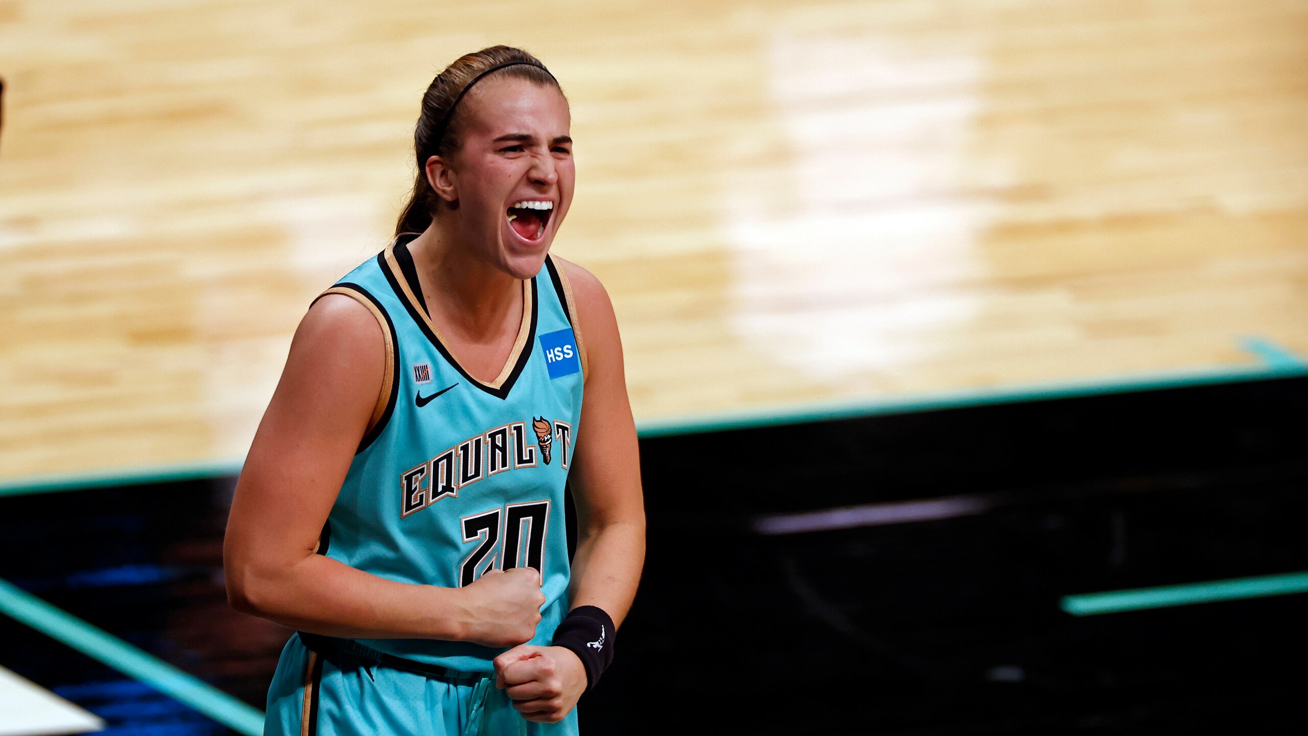 New York Liberty guard Sabrina Ionescu (20) reacts after making the game winning basket against the Indiana Fever during a WNBA basketball game, Friday, May 14, 2021, in New York. (AP Photo/Adam Hunger) New York Liberty guard Sabrina Ionescu (20) reacts after making the game winning basket against the Indiana Fever during a WNBA basketball game, Friday, May 14, 2021, in New York. (AP Photo/Adam Hunger)