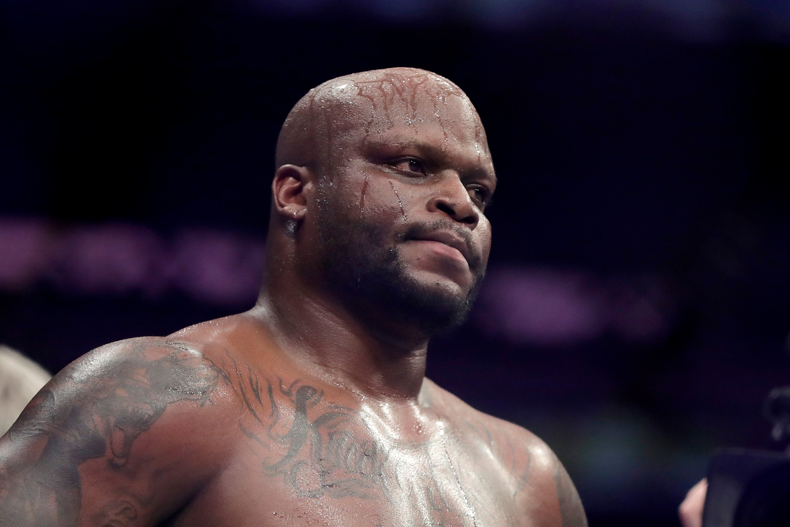 Derrick Lewis reacts after losing by submission to Daniel Cormier during the second round of a heavyweight mixed martial arts bout at UFC 230, early Sunday, Nov. 4, 2018, at Madison Square Garden in New York. (AP Photo/Julio Cortez)