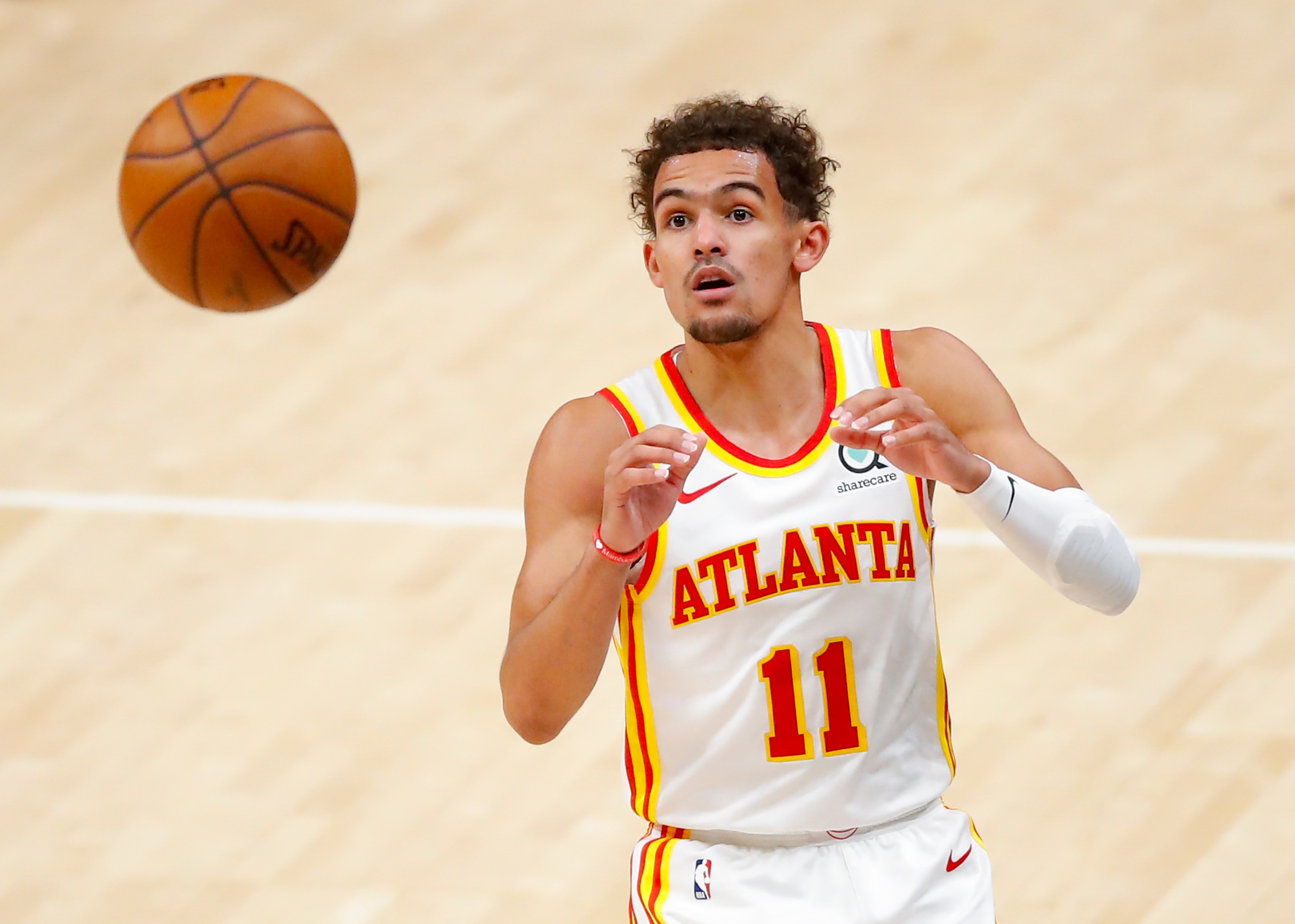 ATLANTA, GA - MAY 13: Trae Young #11 of the Atlanta Hawks awaits the pass during the first half against the Orlando Magic at State Farm Arena on May 13, 2021 in Atlanta, Georgia. NOTE TO USER: User expressly acknowledges and agrees that, by downloading and/or using this photograph, user is consenting to the terms and conditions of the Getty Images License Agreement. (Photo by Todd Kirkland/Getty Images)