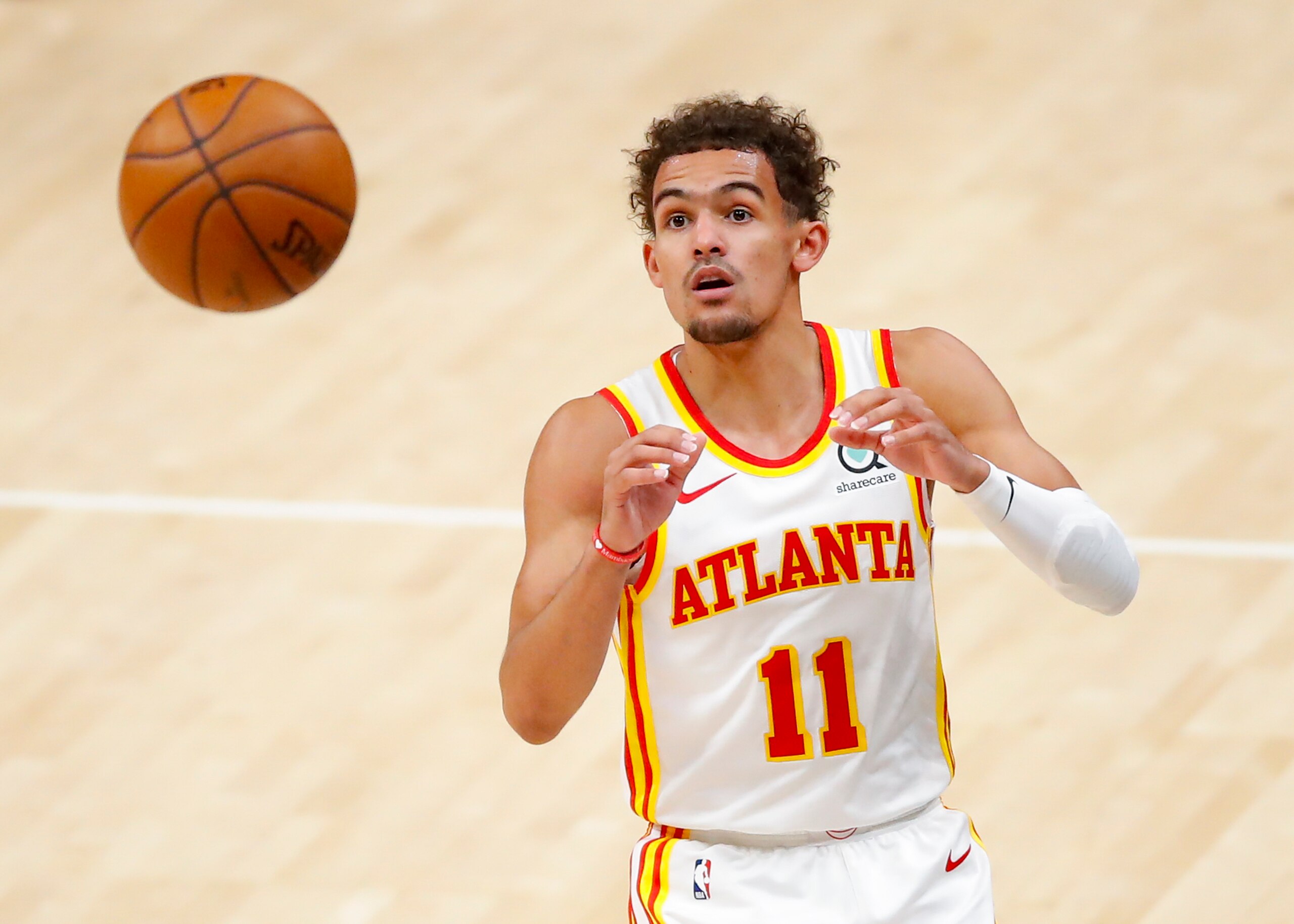 ATLANTA, GA - MAY 13: Trae Young #11 of the Atlanta Hawks awaits the pass during the first half against the Orlando Magic at State Farm Arena on May 13, 2021 in Atlanta, Georgia. NOTE TO USER: User expressly acknowledges and agrees that, by downloading and/or using this photograph, user is consenting to the terms and conditions of the Getty Images License Agreement. (Photo by Todd Kirkland/Getty Images)