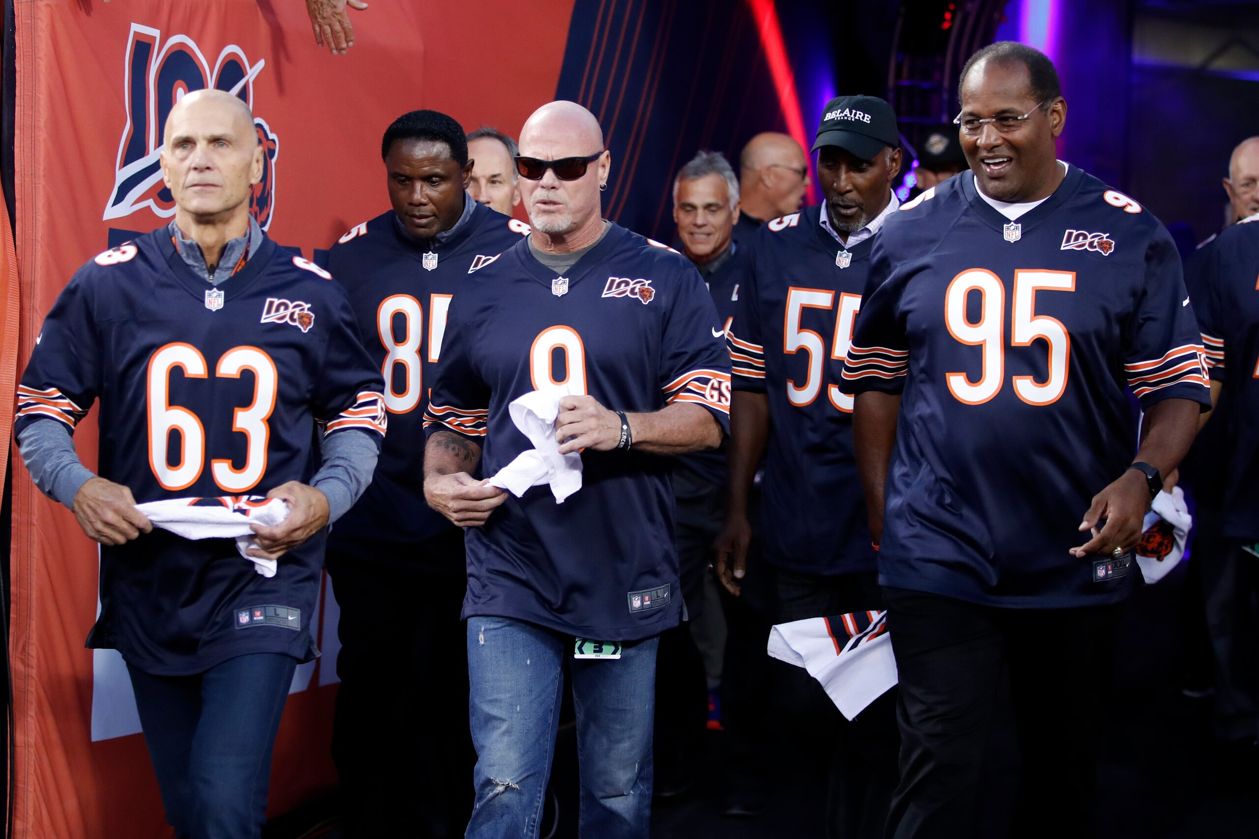 Former Chicago Bears quarterback Jim McMahon (9) and other members of the Super Bowl XX Championship Chicago Bears team are honored before the NFL game between the Green Bay Packers, Thursday, Sept. 5, 2019, in Chicago. Green Bay won the game 10-3. (Jeff Haynes/AP Images for Panini)