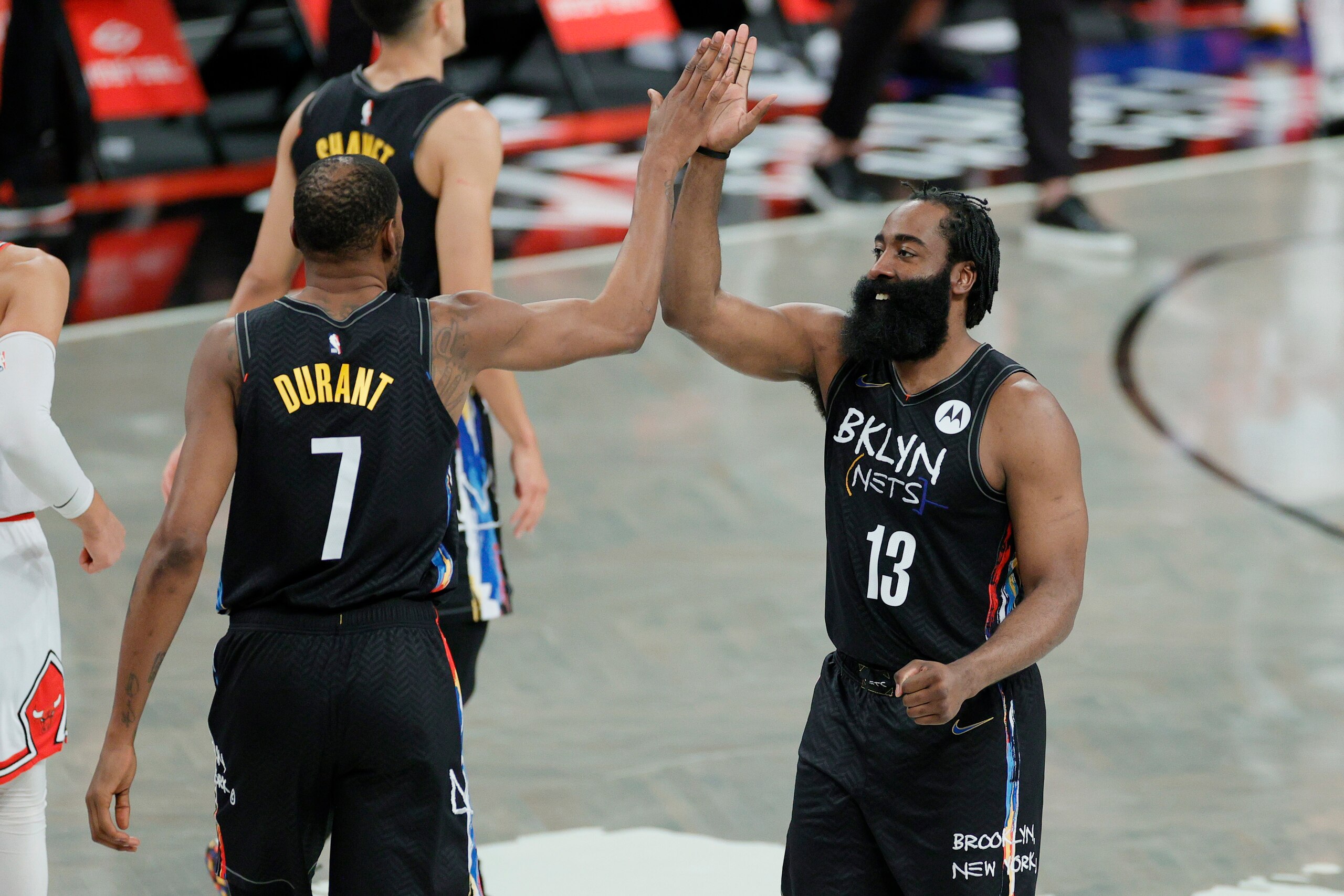 NEW YORK, NEW YORK - MAY 15: James Harden #13 high-fives Kevin Durant #7 of the Brooklyn Nets during the second half against the Chicago Bulls at Barclays Center on May 15, 2021 in the Brooklyn borough of New York City. The Nets won 105-91. NOTE TO USER: User expressly acknowledges and agrees that, by downloading and or using this photograph, User is consenting to the terms and conditions of the Getty Images License Agreement. (Photo by Sarah Stier/Getty Images) NEW YORK, NEW YORK - MAY 15: James Harden #13 high-fives Kevin Durant #7 of the Brooklyn Nets during the second half against the Chicago Bulls at Barclays Center on May 15, 2021 in the Brooklyn borough of New York City. The Nets won 105-91. NOTE TO USER: User expressly acknowledges and agrees that, by downloading and or using this photograph, User is consenting to the terms and conditions of the Getty Images License Agreement. (Photo by Sarah Stier/Getty Images)