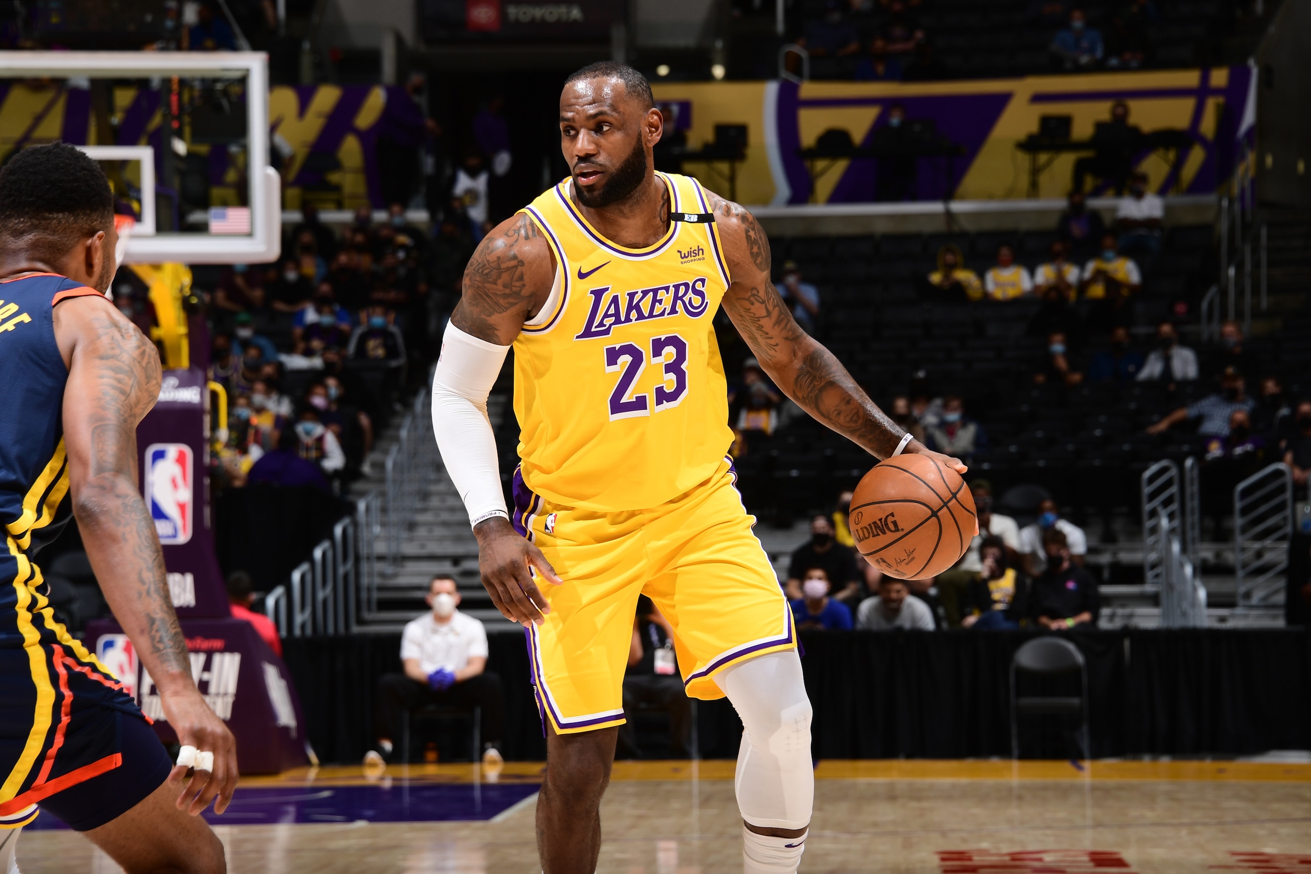 LOS ANGELES, CA - MAY 19: LeBron James #23 of the Los Angeles Lakers dribbles the ball against the Golden State Warriors during the 2021 NBA Play-In Tournament on May 19, 2021 at STAPLES Center in Los Angeles, California. NOTE TO USER: User expressly acknowledges and agrees that, by downloading and/or using this Photograph, user is consenting to the terms and conditions of the Getty Images License Agreement. Mandatory Copyright Notice: Copyright 2021 NBAE (Photo by Adam Pantozzi/NBAE via Getty Images) LOS ANGELES, CA - MAY 19: LeBron James #23 of the Los Angeles Lakers dribbles the ball against the Golden State Warriors during the 2021 NBA Play-In Tournament on May 19, 2021 at STAPLES Center in Los Angeles, California. NOTE TO USER: User expressly acknowledges and agrees that, by downloading and/or using this Photograph, user is consenting to the terms and conditions of the Getty Images License Agreement. Mandatory Copyright Notice: Copyright 2021 NBAE (Photo by Adam Pantozzi/NBAE via Getty Images)