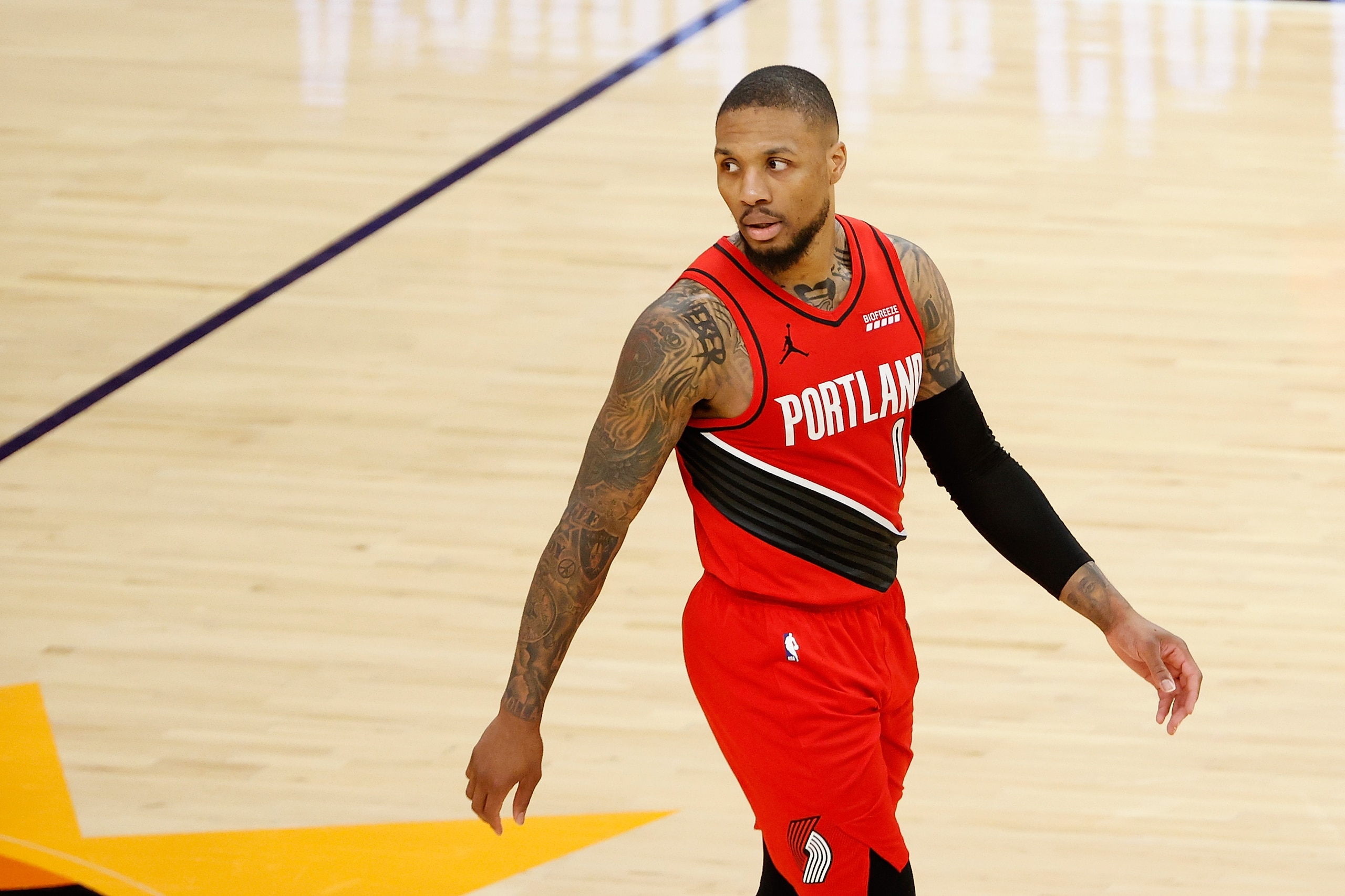 PHOENIX, ARIZONA - MAY 13: Damian Lillard #0 of the Portland Trail Blazers during the second half of the NBA game at Phoenix Suns Arena on May 13, 2021 in Phoenix, Arizona.  NOTE TO USER: User expressly acknowledges and agrees that, by downloading and or using this photograph, User is consenting to the terms and conditions of the Getty Images License Agreement. (Photo by Christian Petersen/Getty Images)