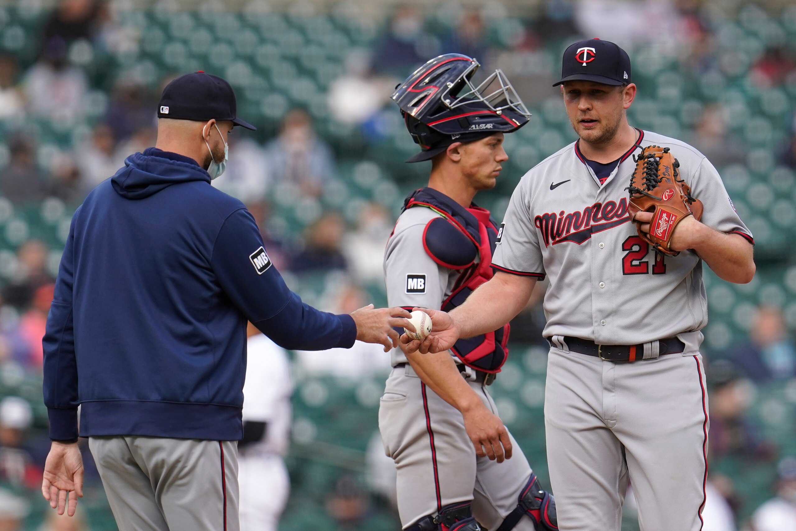 Minnesota Twins manager Rocco Baldelli takes the ball from relief pitcher Tyler Duffey (21) in the seventh inning of a baseball game against the Detroit Tigers in Detroit, Saturday, May 8, 2021. (AP Photo/Paul Sancya) Minnesota Twins manager Rocco Baldelli takes the ball from relief pitcher Tyler Duffey (21) in the seventh inning of a baseball game against the Detroit Tigers in Detroit, Saturday, May 8, 2021. (AP Photo/Paul Sancya)