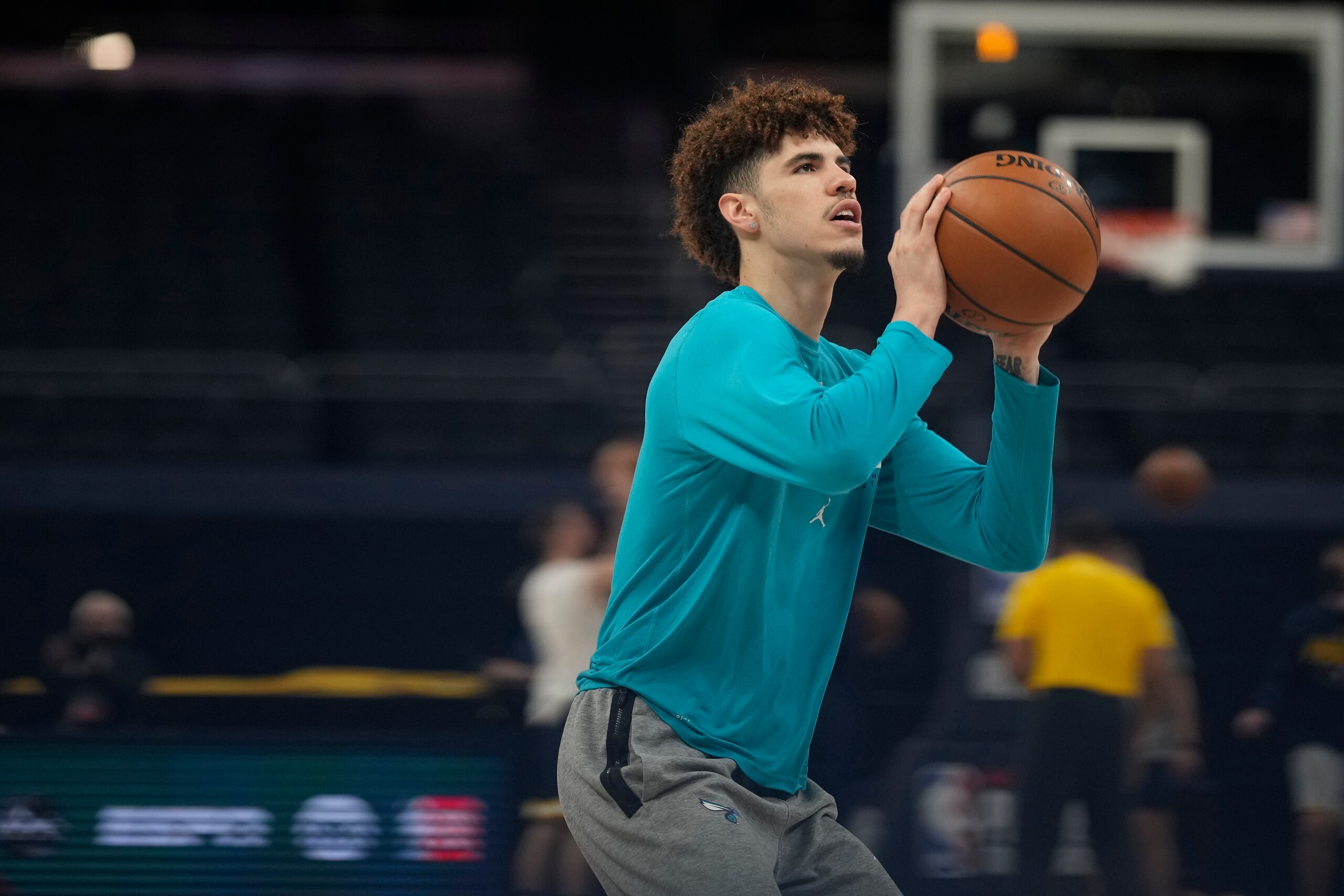INDIANAPOLIS, IN - MAY 18: LaMelo Ball #2 of the Charlotte Hornets warms up prior to the game against the Indiana Pacers during the 2021 NBA Play-In Tournament on May 18, 2021 at Bankers Life Fieldhouse in Indianapolis, Indiana. NOTE TO USER: User expressly acknowledges and agrees that, by downloading and or using this Photograph, user is consenting to the terms and conditions of the Getty Images License Agreement. Mandatory Copyright Notice: Copyright 2021 NBAE (Photo by A.J. Mast/NBAE via Getty Images) INDIANAPOLIS, IN - MAY 18: LaMelo Ball #2 of the Charlotte Hornets warms up prior to the game against the Indiana Pacers during the 2021 NBA Play-In Tournament on May 18, 2021 at Bankers Life Fieldhouse in Indianapolis, Indiana. NOTE TO USER: User expressly acknowledges and agrees that, by downloading and or using this Photograph, user is consenting to the terms and conditions of the Getty Images License Agreement. Mandatory Copyright Notice: Copyright 2021 NBAE (Photo by A.J. Mast/NBAE via Getty Images)
