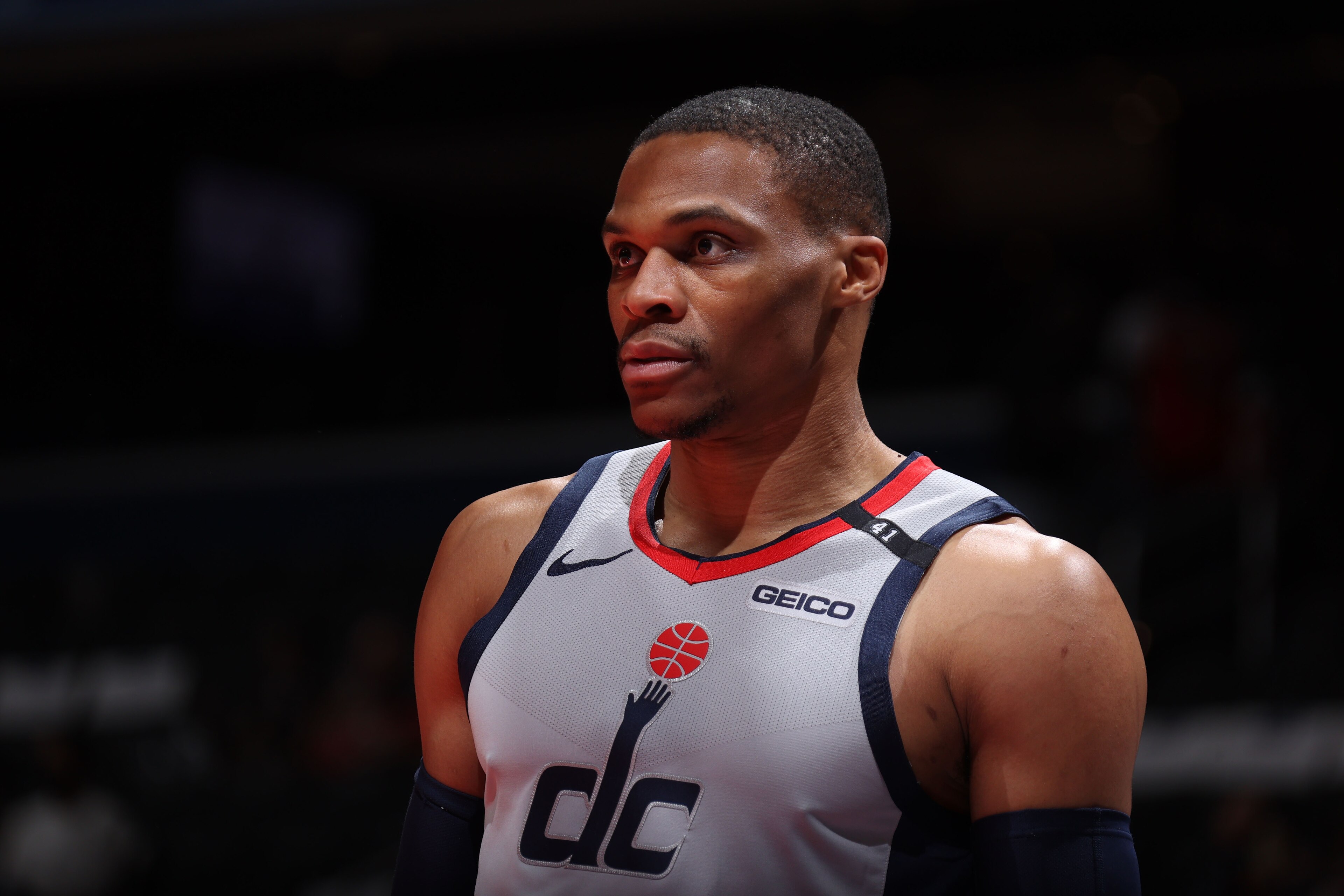 WASHINGTON, DC -¬ MAY 20: Russell Westbrook #4 of the Washington Wizards looks on before the game against the Indiana Pacers during the 2021 NBA Play-In Tournament on May 20, 2021 at Capital One Arena in Washington, DC. NOTE TO USER: User expressly acknowledges and agrees that, by downloading and or using this Photograph, user is consenting to the terms and conditions of the Getty Images License Agreement. Mandatory Copyright Notice: Copyright 2021 NBAE (Photo by Stephen Gosling/NBAE via Getty Images) WASHINGTON, DC -¬ MAY 20: Russell Westbrook #4 of the Washington Wizards looks on before the game against the Indiana Pacers during the 2021 NBA Play-In Tournament on May 20, 2021 at Capital One Arena in Washington, DC. NOTE TO USER: User expressly acknowledges and agrees that, by downloading and or using this Photograph, user is consenting to the terms and conditions of the Getty Images License Agreement. Mandatory Copyright Notice: Copyright 2021 NBAE (Photo by Stephen Gosling/NBAE via Getty Images)