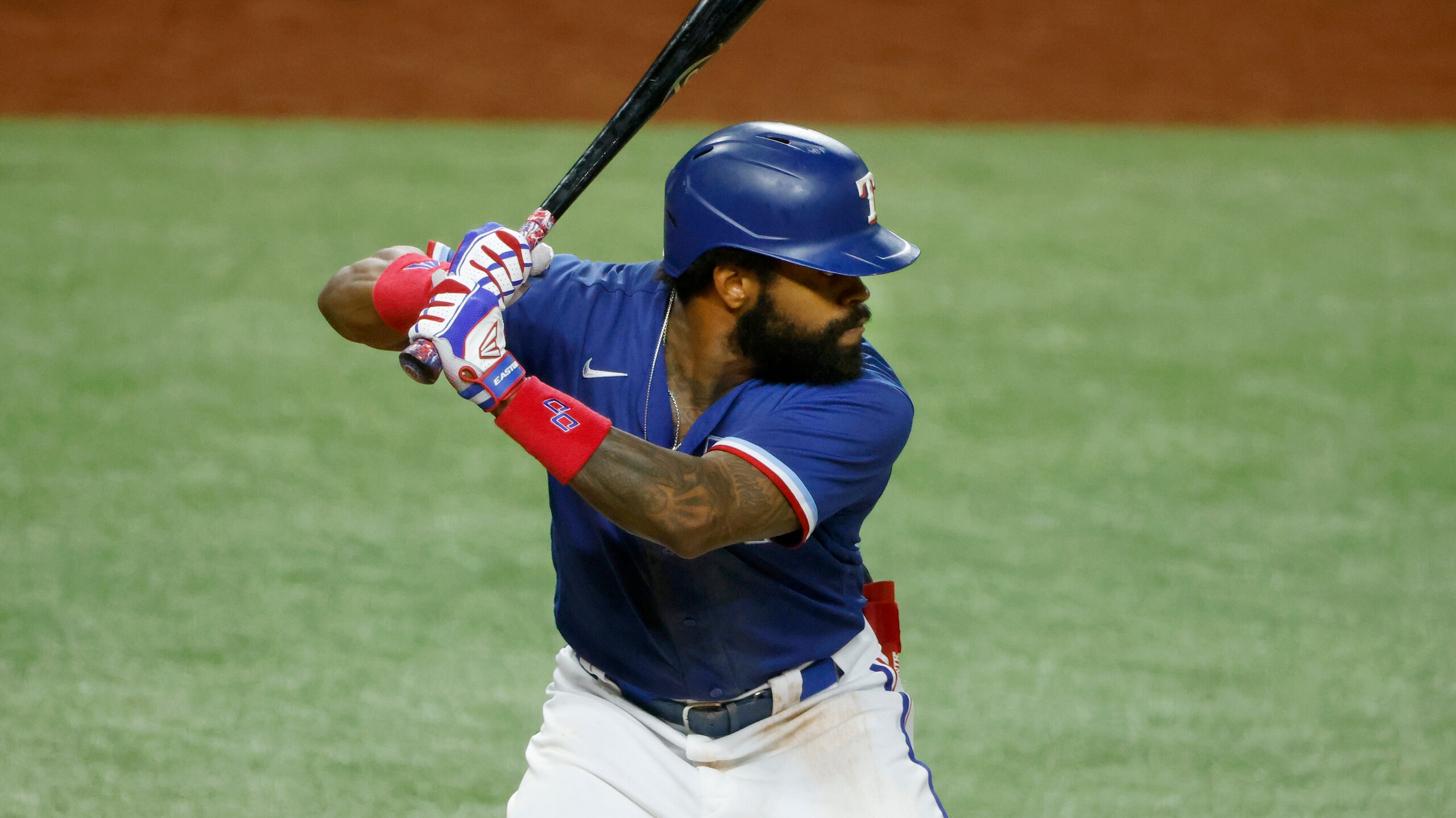 Texas Rangers Delino DeShields bats against the Kansas City Royals during an alternate training site baseball game, Friday, April 23, 2021, in Arlington, Texas. (AP Photo/Michael Ainsworth)