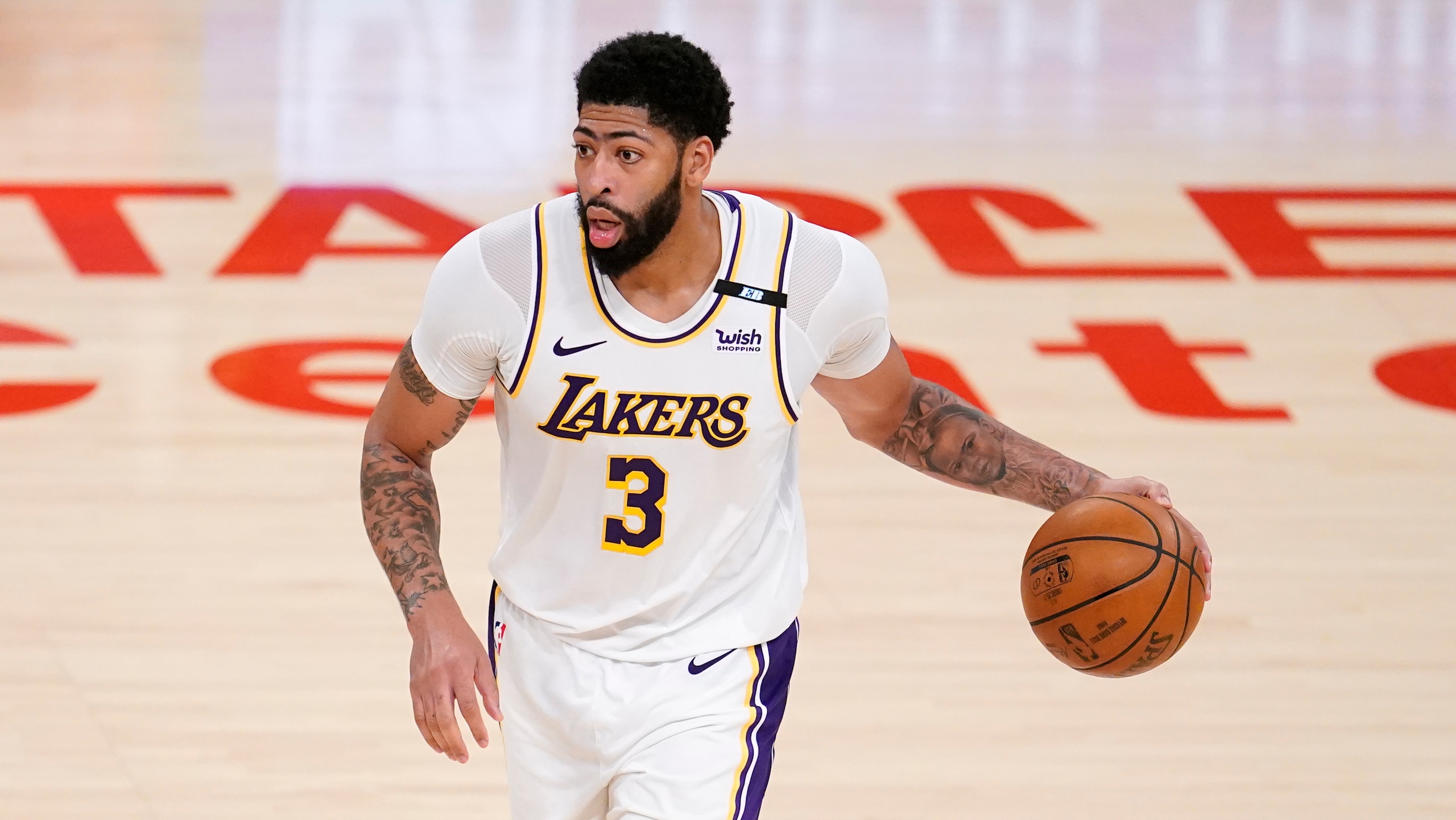 Los Angeles Lakers forward Anthony Davis dribbles during an NBA basketball game against the Phoenix Suns Sunday, May 9, 2021 in Los Angeles. (AP Photo/Marcio Jose Sanchez) Los Angeles Lakers forward Anthony Davis dribbles during an NBA basketball game against the Phoenix Suns Sunday, May 9, 2021 in Los Angeles. (AP Photo/Marcio Jose Sanchez)