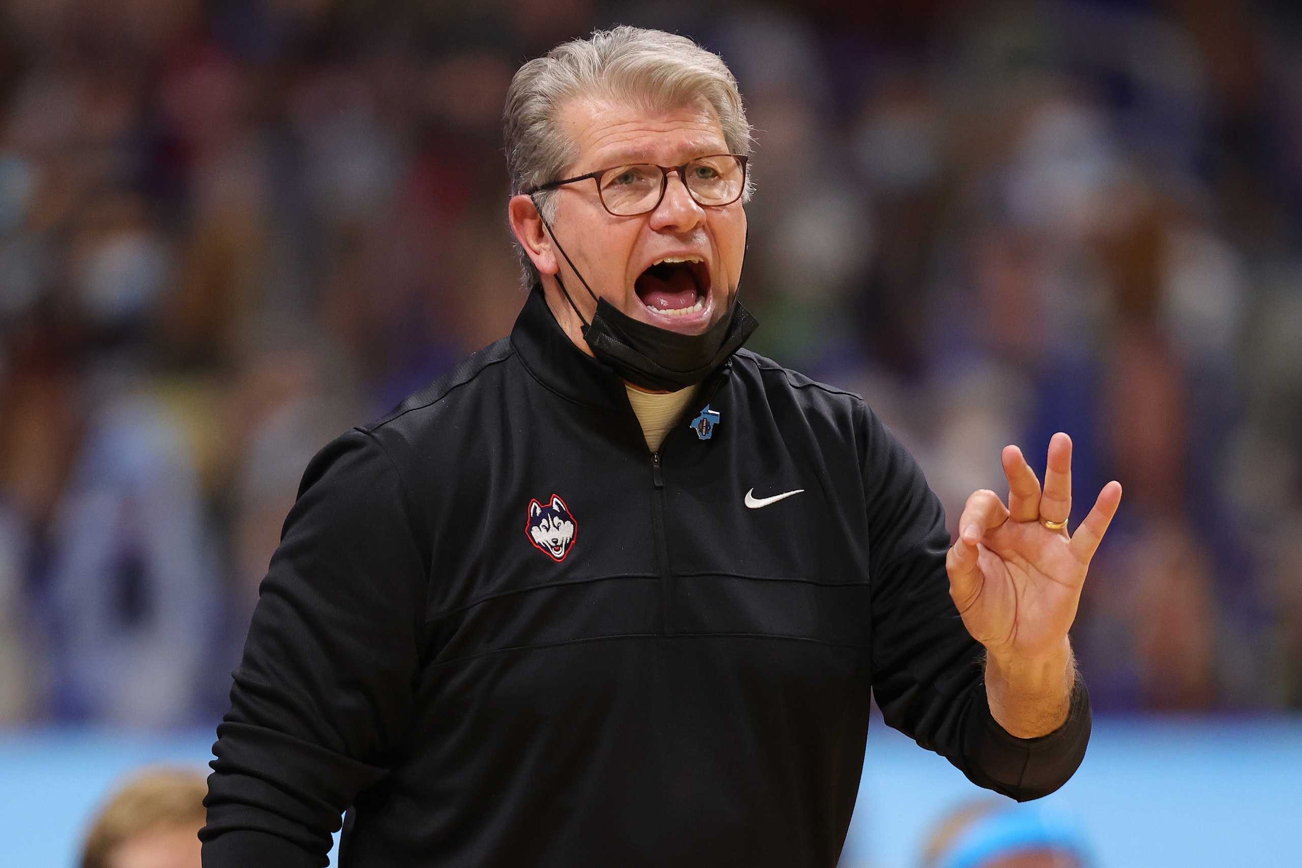 SAN ANTONIO, TEXAS - APRIL 02: Head coach Geno Auriemma of the UConn Huskies calls out to players against the Arizona Wildcats during the second quarter in the Final Four semifinal game of the 2021 NCAA Women's Basketball Tournament at the Alamodome on April 02, 2021 in San Antonio, Texas. (Photo by Carmen Mandato/Getty Images)