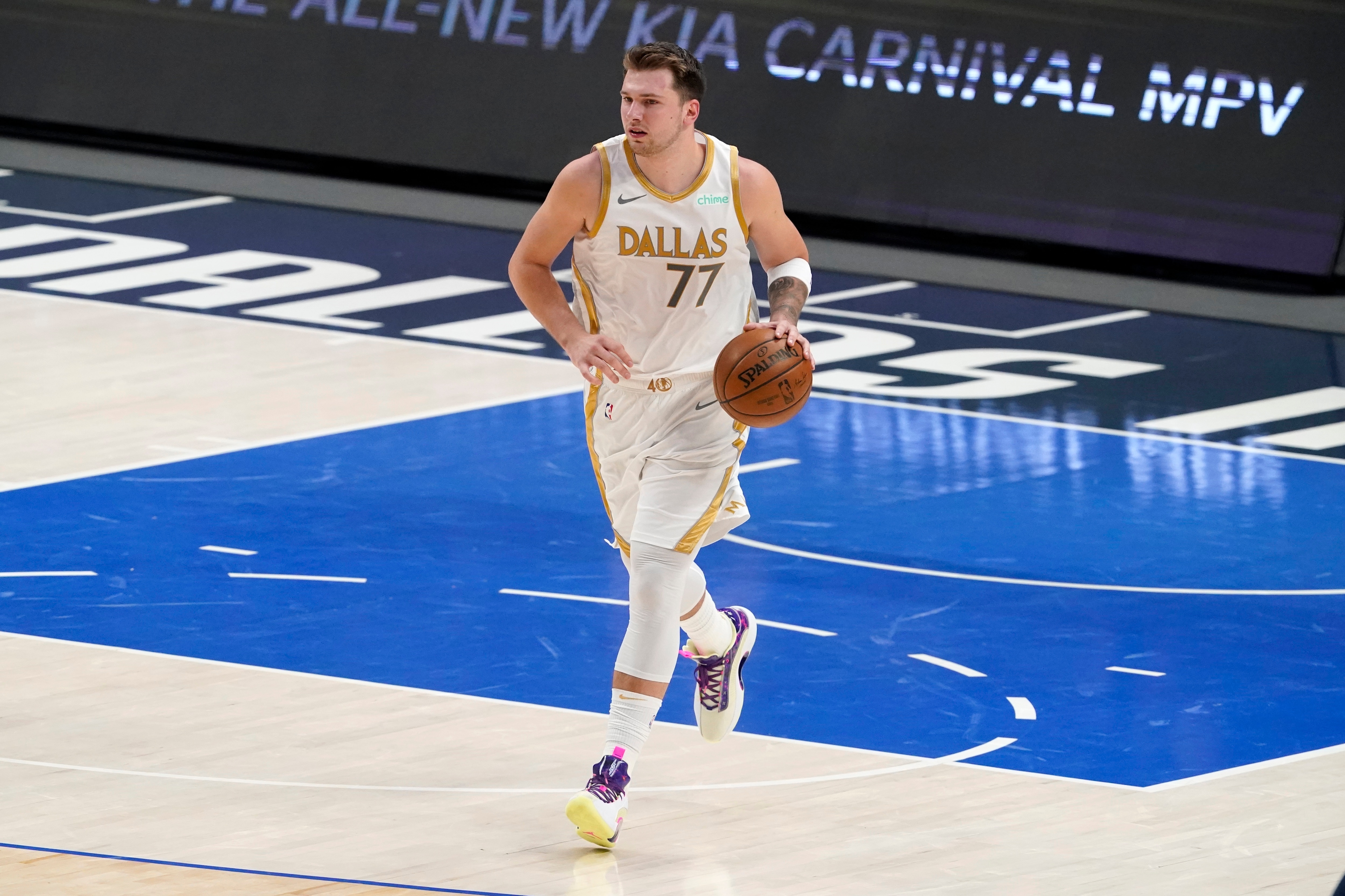 Dallas Mavericks' Luka Doncic advances the ball up court during an NBA basketball game against the Brooklyn Nets in Dallas, Thursday, May 6, 2021. (AP Photo/Tony Gutierrez)