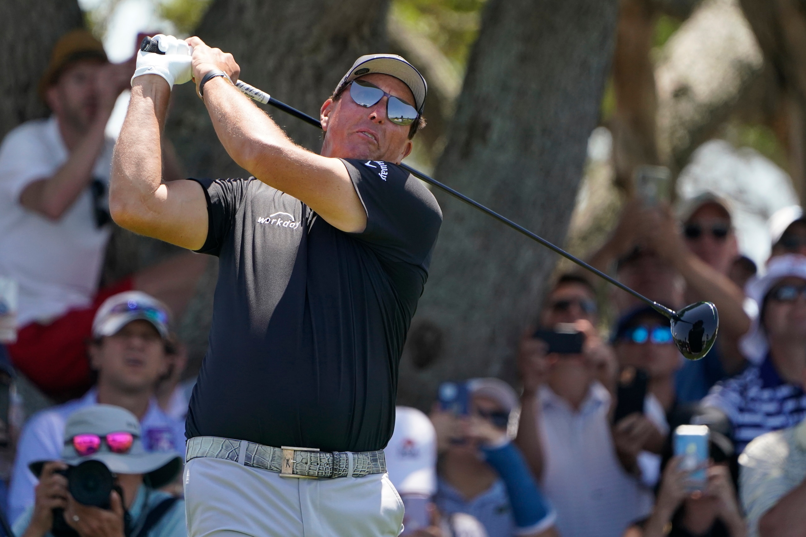 Phil Mickelson watches his tee shot on the seventh hole during the second round of the PGA Championship golf tournament on the Ocean Course Friday, May 21, 2021, in Kiawah Island, S.C. (AP Photo/Chris Carlson)