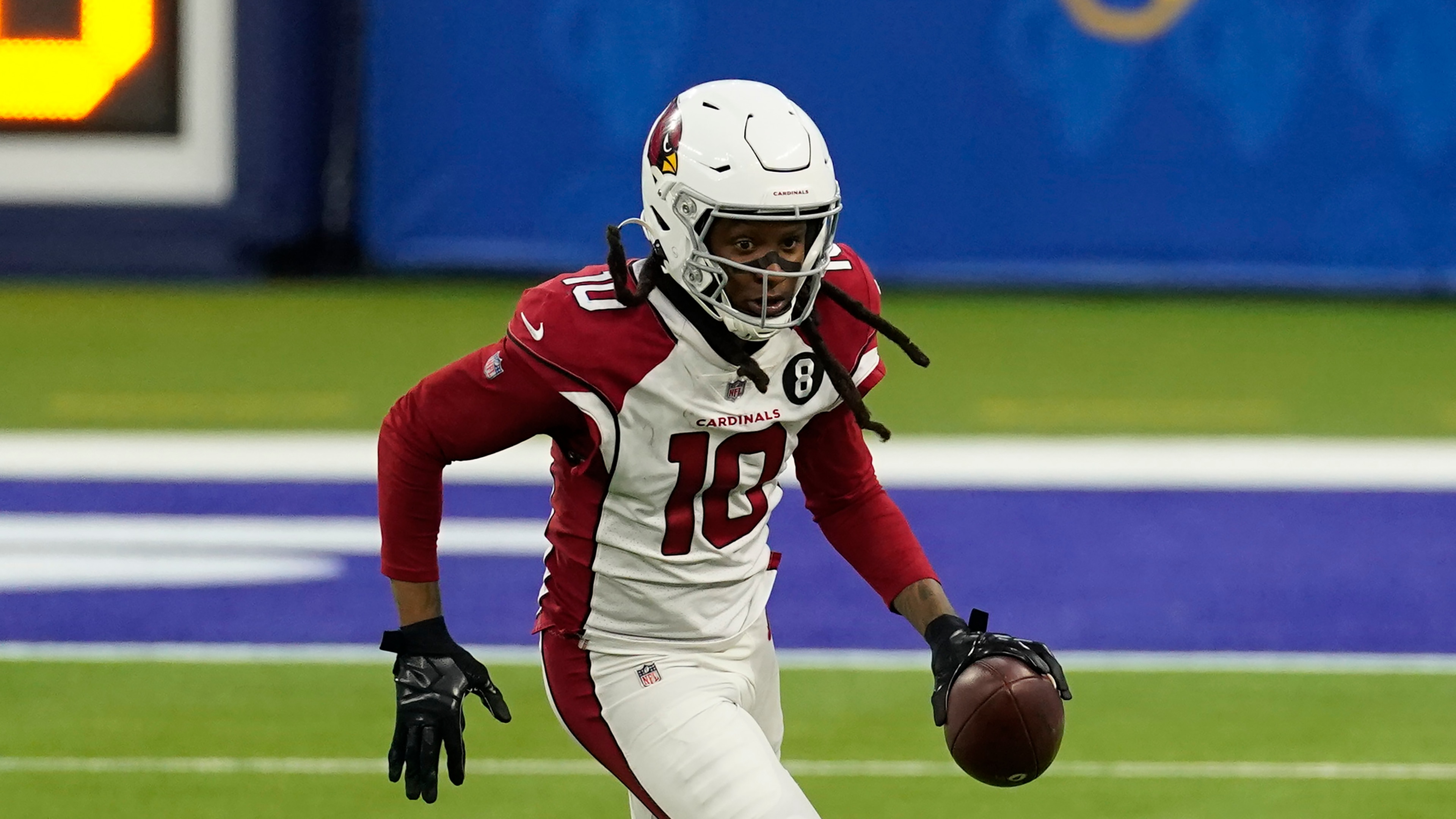 Arizona Cardinals wide receiver DeAndre Hopkins (10) runs the ball during the second half of an NFL football game against the Los Angeles Rams Sunday, Jan. 3, 2021, in Inglewood, Calif. (AP Photo/Ashley Landis)