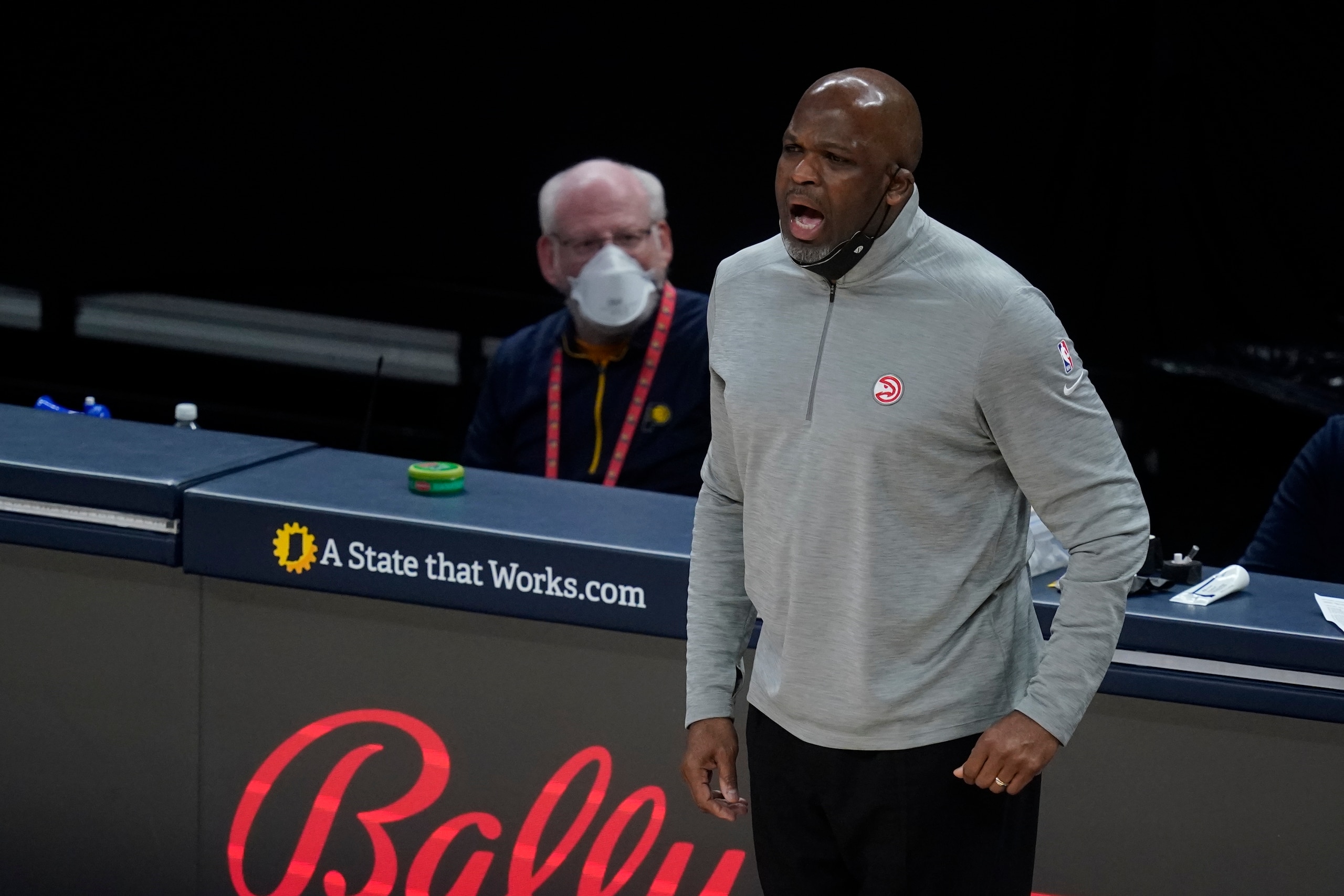 Atlanta Hawks head coach Nate McMillan in action during the first half of an NBA basketball game against the Indiana Pacers, Thursday, May 6, 2021, in Indianapolis. (AP Photo/Darron Cummings)