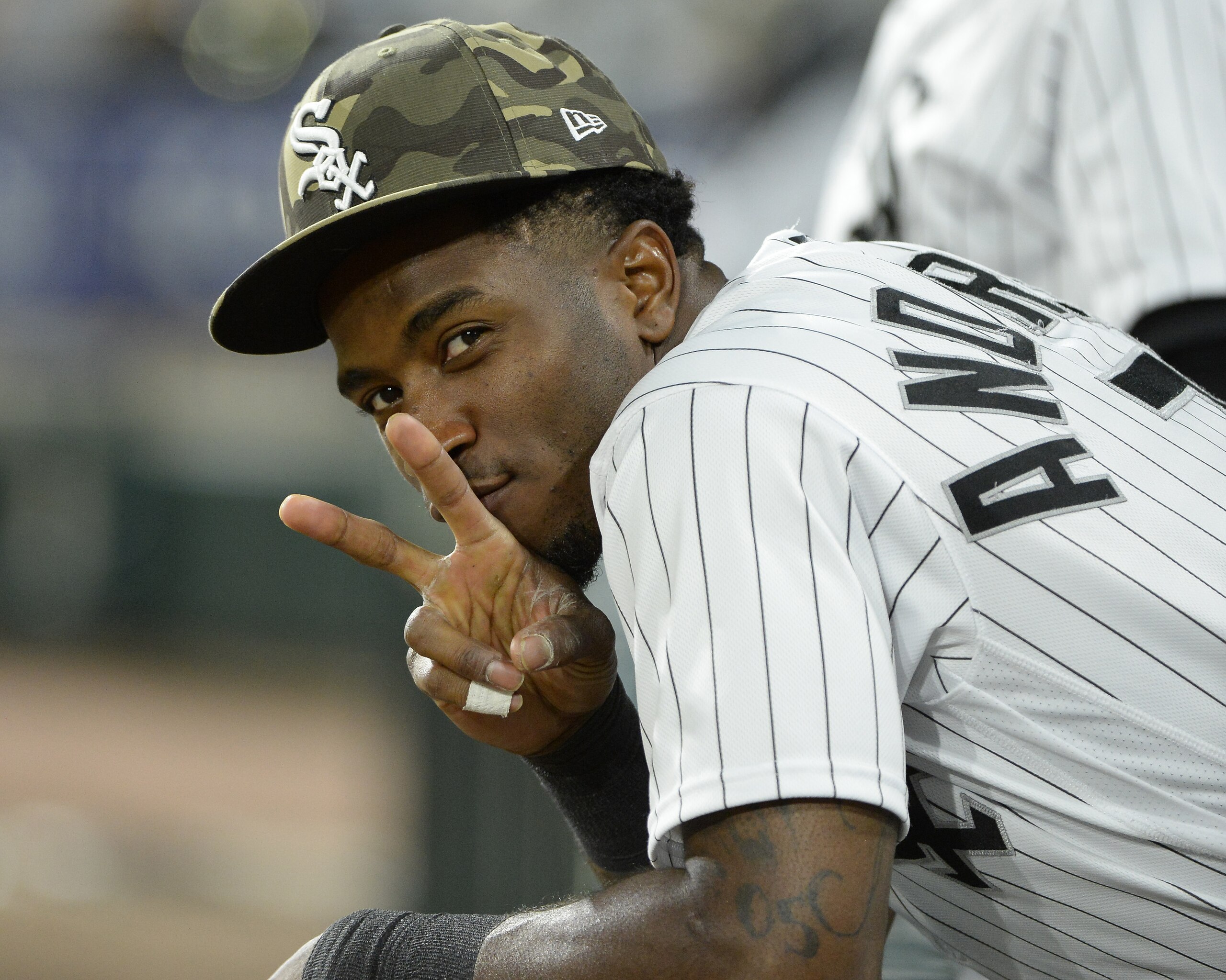 CHICAGO - MAY 14:  Tim Anderson #7 of the Chicago White Sox gestures while looking on against the Kansas City Royals during game two of a doubleheader on May 14, 2021 at Guaranteed Rate Field in Chicago, Illinois.  The players wore special caps and other items during Armed Forces Weekend, celebrated by Major League Baseball.  (Photo by Ron Vesely/Getty Images)