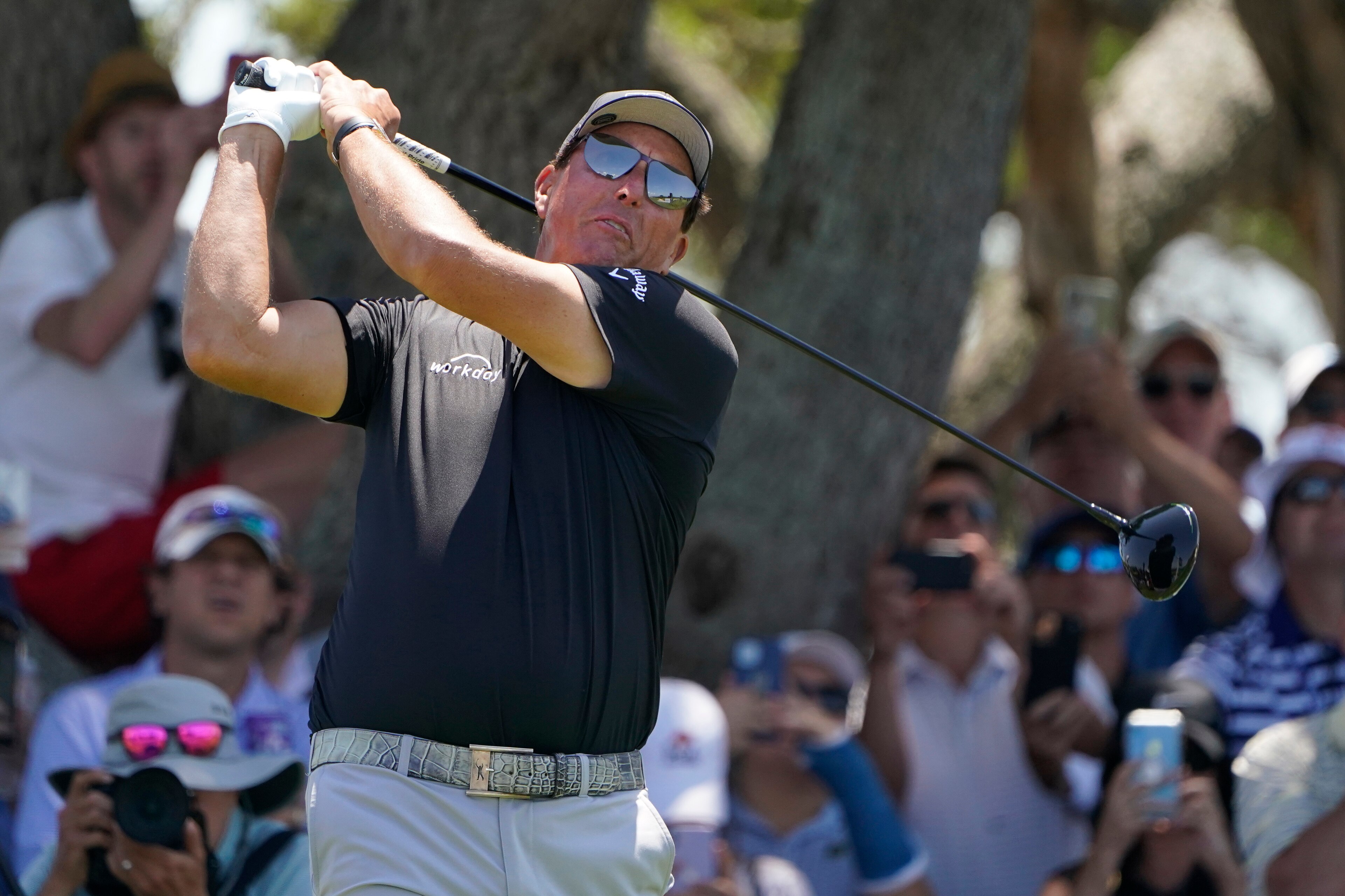 Phil Mickelson watches his tee shot on the seventh hole during the second round of the PGA Championship golf tournament on the Ocean Course Friday, May 21, 2021, in Kiawah Island, S.C. (AP Photo/Chris Carlson)