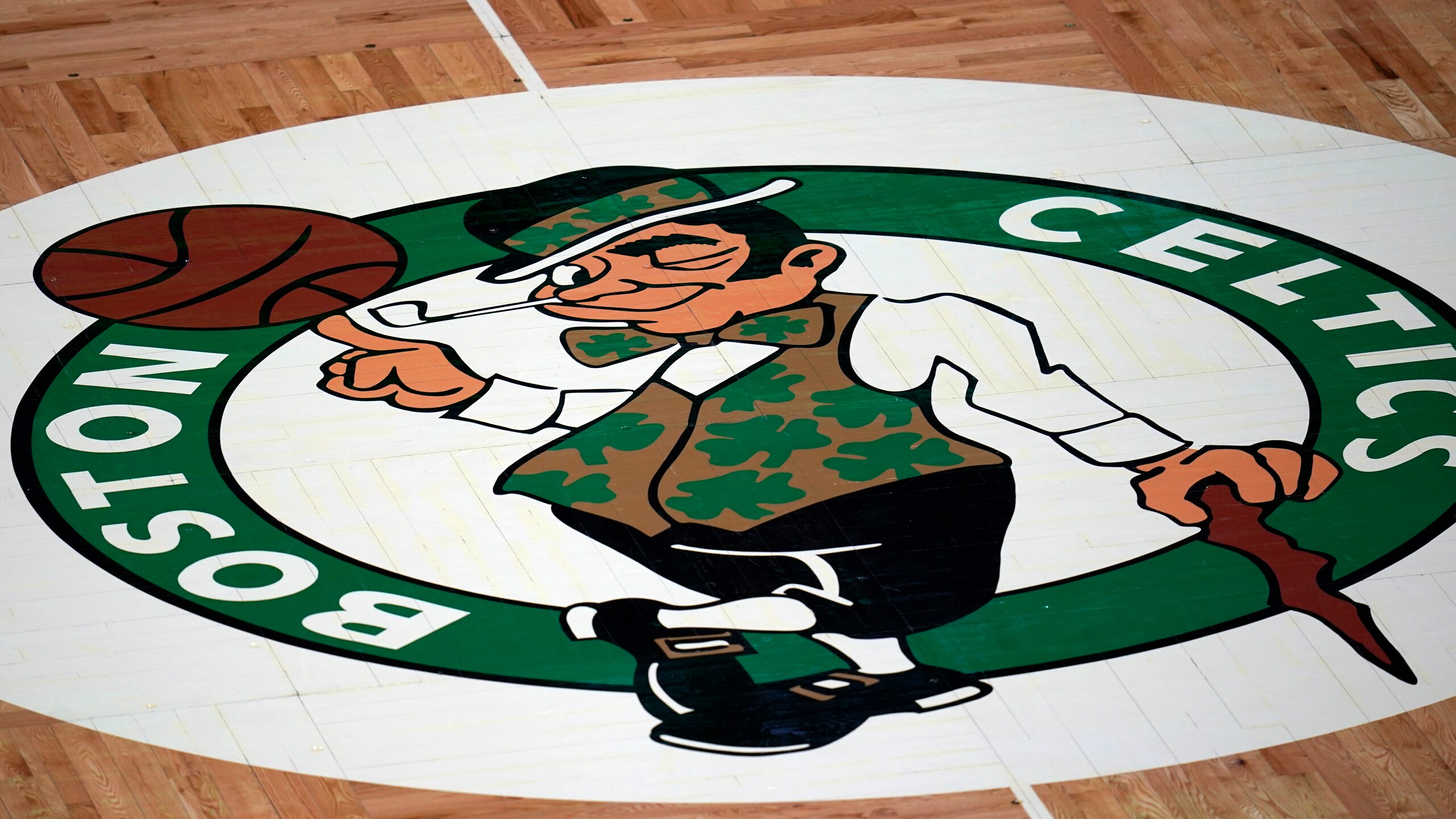 The Boston Celtics logo during an NBA basketball game, Wednesday, April 28, 2021, in Boston. (AP Photo/Charles Krupa)