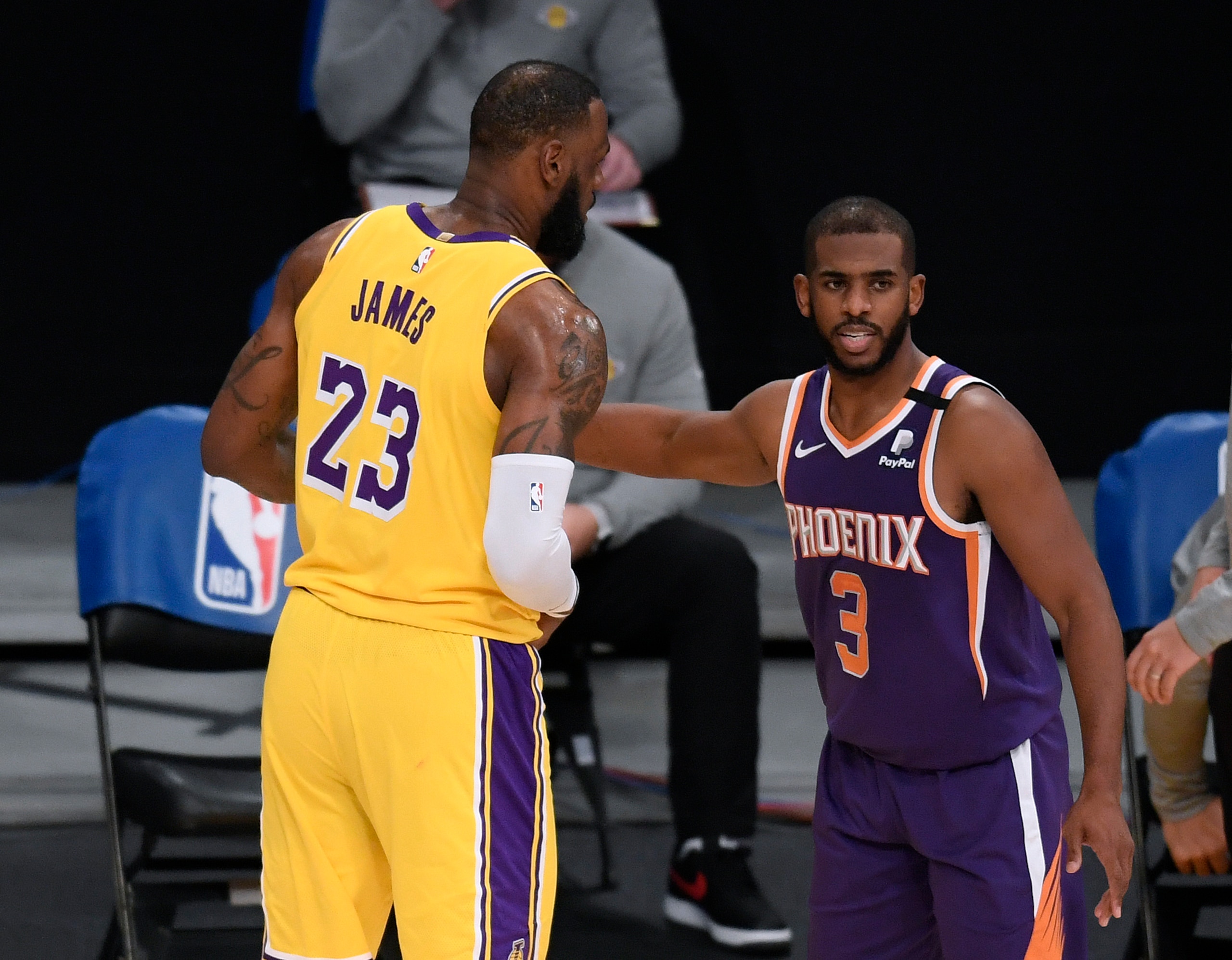 LOS ANGELES, CALIFORNIA - MARCH 02: Chris Paul #3 of the Phoenix Suns and LeBron James #23 of the Los Angeles Lakers shake hands after a 114-104 Suns win at Staples Center on March 02, 2021 in Los Angeles, California. (Photo by Harry How/Getty Images) NOTE TO USER: User expressly acknowledges and agrees that, by downloading and/or using this Photograph, user is consenting to the terms and conditions of the Getty Images License Agreement. Mandatory Copyright Notice: Copyright 2021 NBAE. LOS ANGELES, CALIFORNIA - MARCH 02: Chris Paul #3 of the Phoenix Suns and LeBron James #23 of the Los Angeles Lakers shake hands after a 114-104 Suns win at Staples Center on March 02, 2021 in Los Angeles, California. (Photo by Harry How/Getty Images) NOTE TO USER: User expressly acknowledges and agrees that, by downloading and/or using this Photograph, user is consenting to the terms and conditions of the Getty Images License Agreement. Mandatory Copyright Notice: Copyright 2021 NBAE.