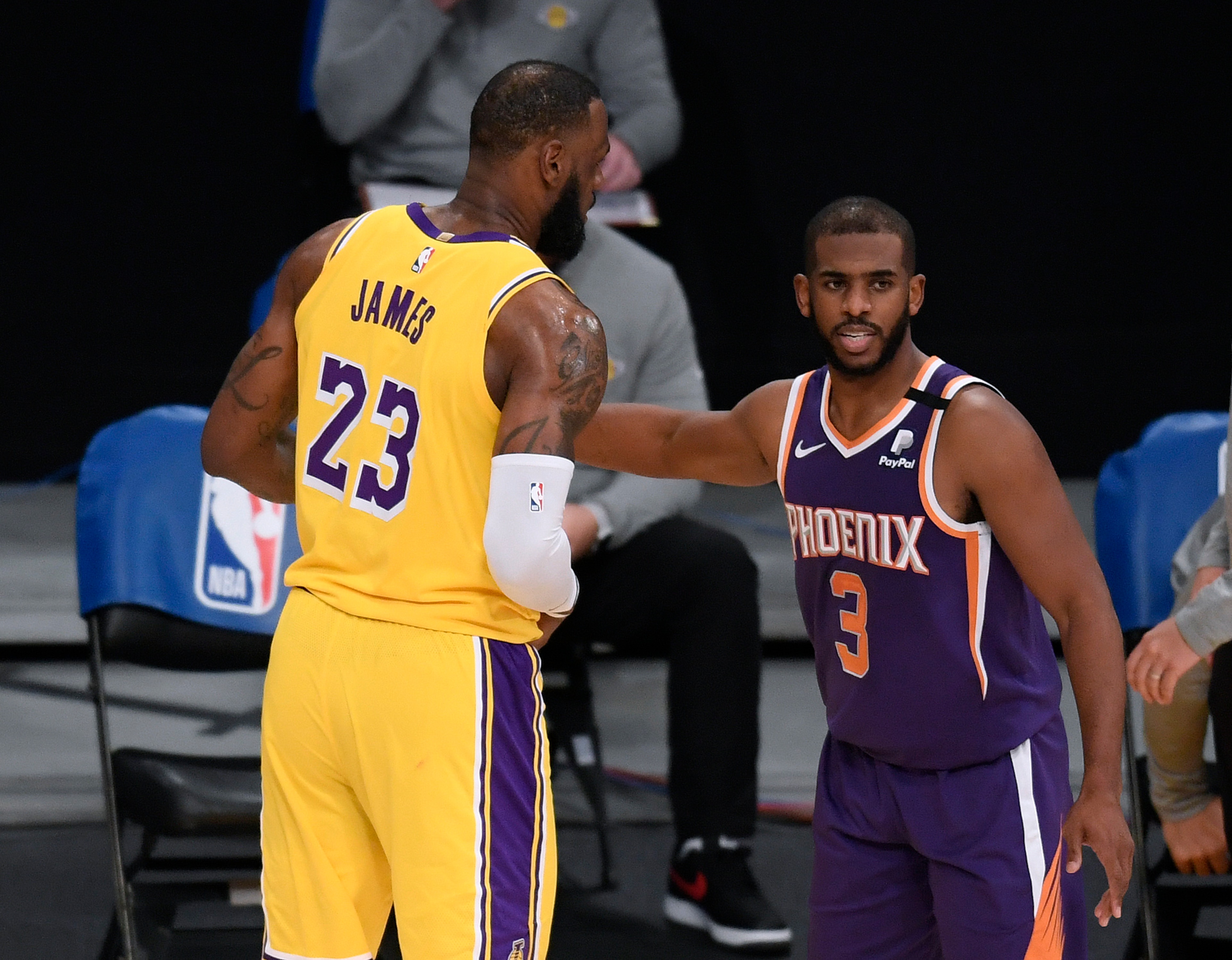 LOS ANGELES, CALIFORNIA - MARCH 02: Chris Paul #3 of the Phoenix Suns and LeBron James #23 of the Los Angeles Lakers shake hands after a 114-104 Suns win at Staples Center on March 02, 2021 in Los Angeles, California. (Photo by Harry How/Getty Images) NOTE TO USER: User expressly acknowledges and agrees that, by downloading and/or using this Photograph, user is consenting to the terms and conditions of the Getty Images License Agreement. Mandatory Copyright Notice: Copyright 2021 NBAE. LOS ANGELES, CALIFORNIA - MARCH 02: Chris Paul #3 of the Phoenix Suns and LeBron James #23 of the Los Angeles Lakers shake hands after a 114-104 Suns win at Staples Center on March 02, 2021 in Los Angeles, California. (Photo by Harry How/Getty Images) NOTE TO USER: User expressly acknowledges and agrees that, by downloading and/or using this Photograph, user is consenting to the terms and conditions of the Getty Images License Agreement. Mandatory Copyright Notice: Copyright 2021 NBAE.