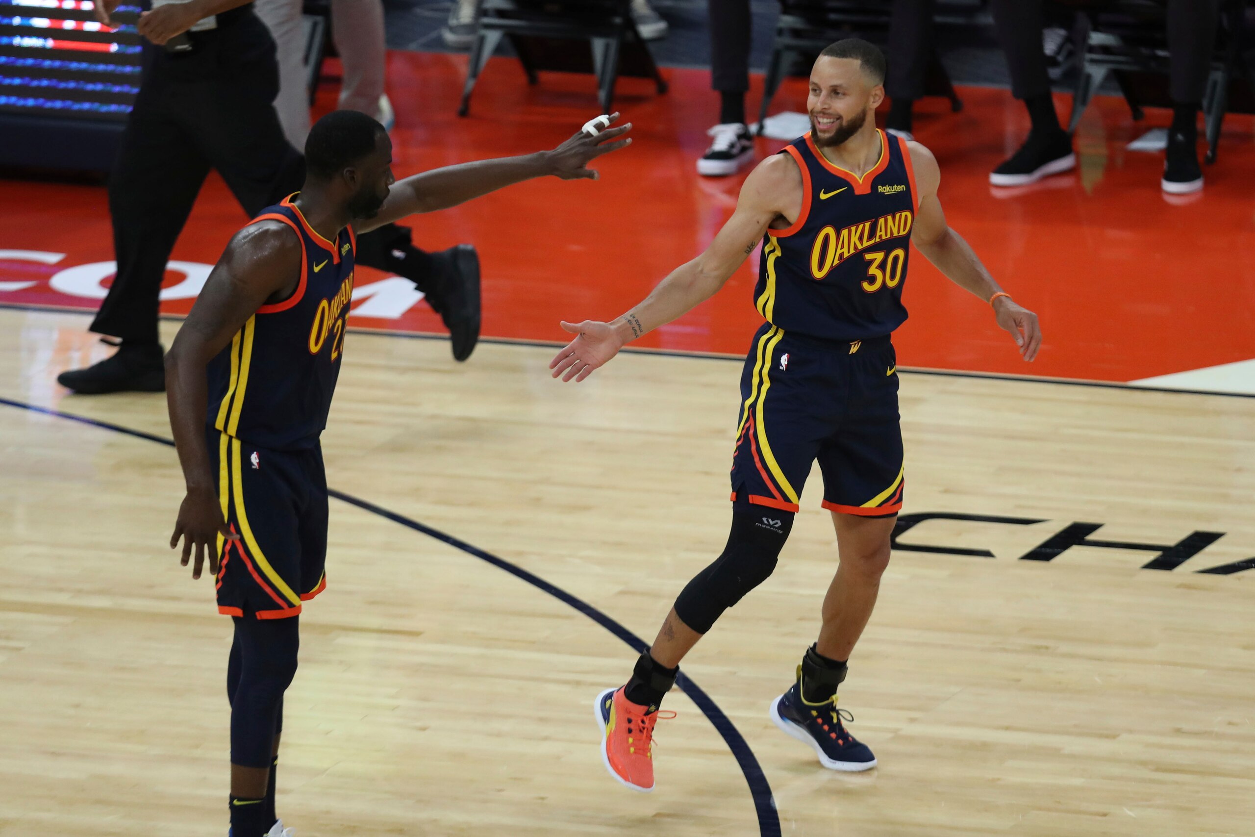 Golden State Warriors' Stephen Curry, right, is congratulated by teammate Draymond Green during the first half of an NBA basketball Western Conference play-in game against the Memphis Grizzlies in San Francisco, Friday, May 21, 2021. (AP Photo/Jed Jacobsohn) Golden State Warriors' Stephen Curry, right, is congratulated by teammate Draymond Green during the first half of an NBA basketball Western Conference play-in game against the Memphis Grizzlies in San Francisco, Friday, May 21, 2021. (AP Photo/Jed Jacobsohn)
