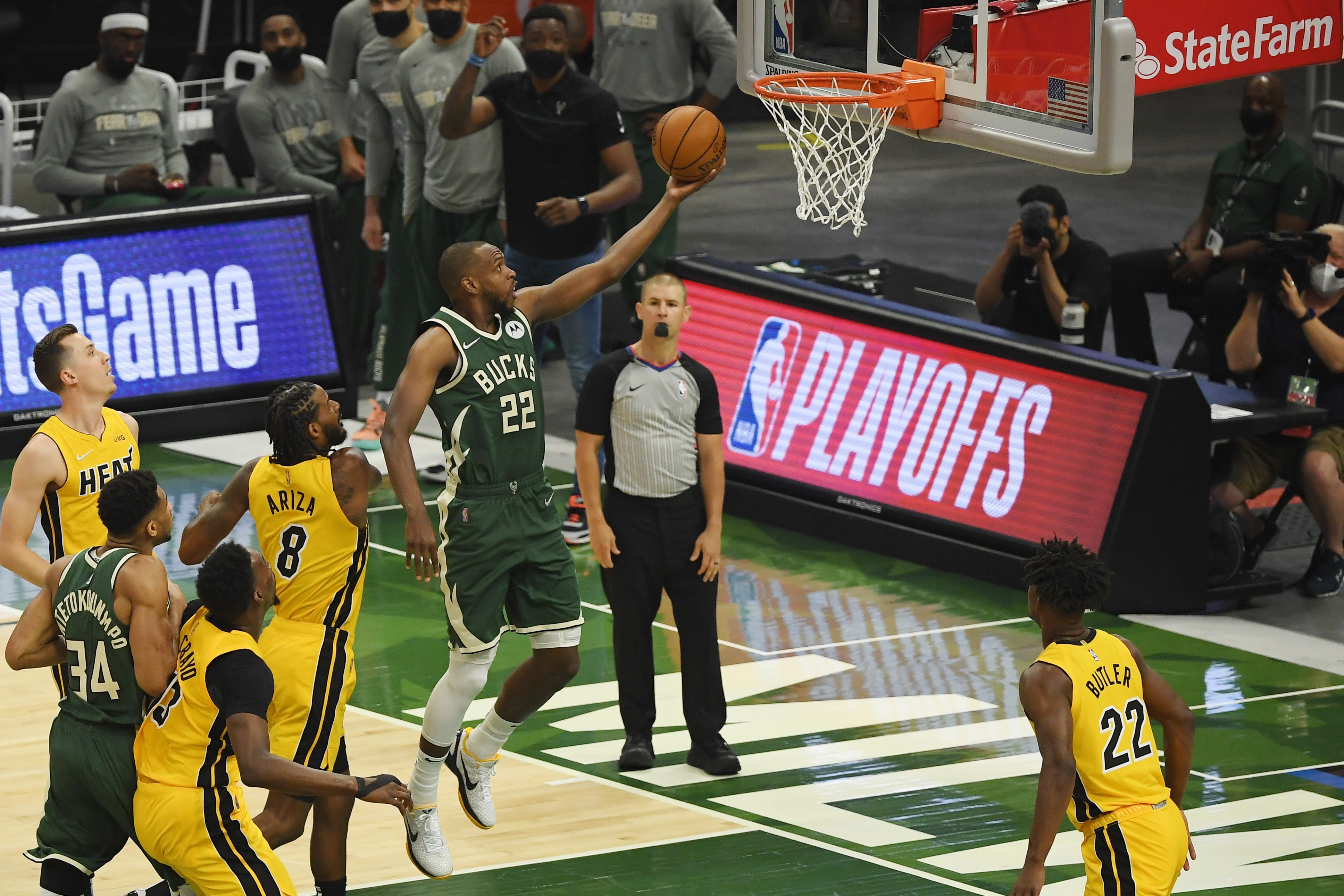 MILWAUKEE, WISCONSIN - MAY 22: Khris Middleton #22 of the Milwaukee Bucks shoots in the first quarter against the Miami Heat during Game 1 of their Eastern Conference first-round playoff series at Fiserv Forum on May 22, 2021 in Milwaukee, Wisconsin.  NOTE TO USER: User expressly acknowledges and agrees that, by downloading and or using this photograph, User is consenting to the terms and conditions of the Getty Images License Agreement. (Photo by Quinn Harris/Getty Images)