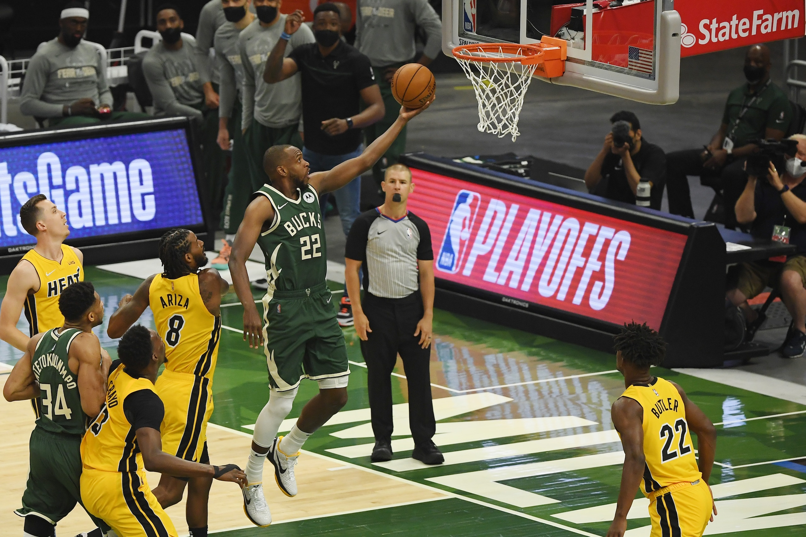 MILWAUKEE, WISCONSIN - MAY 22: Khris Middleton #22 of the Milwaukee Bucks shoots in the first quarter against the Miami Heat during Game 1 of their Eastern Conference first-round playoff series at Fiserv Forum on May 22, 2021 in Milwaukee, Wisconsin.  NOTE TO USER: User expressly acknowledges and agrees that, by downloading and or using this photograph, User is consenting to the terms and conditions of the Getty Images License Agreement. (Photo by Quinn Harris/Getty Images)