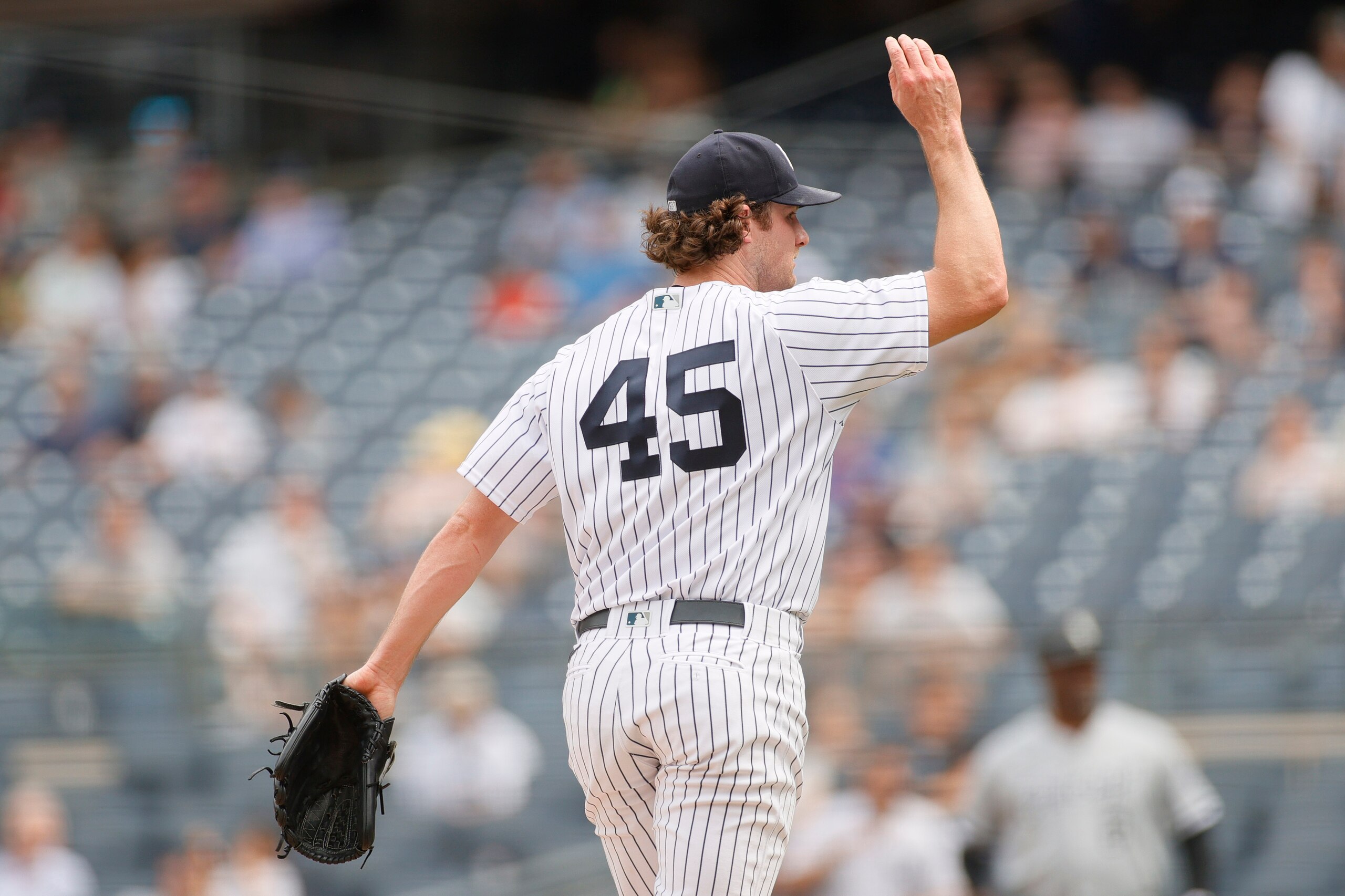 NEW YORK, NEW YORK - MAY 22: Gerrit Cole #45 of the New York Yankees reacts after pitching during the seventh inning against the Chicago White Sox at Yankee Stadium on May 22, 2021 in the Bronx borough of New York City. (Photo by Sarah Stier/Getty Images)