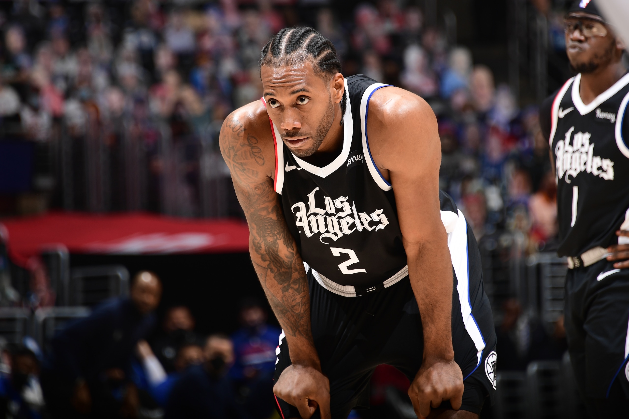 LOS ANGELES, CA - MAY 22: Kawhi Leonard #2 of the LA Clippers looks on during Round 1, Game 1 of the the 2021 NBA Playoffs on May 22, 2021 at STAPLES Center in Los Angeles, California. NOTE TO USER: User expressly acknowledges and agrees that, by downloading and/or using this Photograph, user is consenting to the terms and conditions of the Getty Images License Agreement. Mandatory Copyright Notice: Copyright 2021 NBAE (Photo by Adam Pantozzi/NBAE via Getty Images)