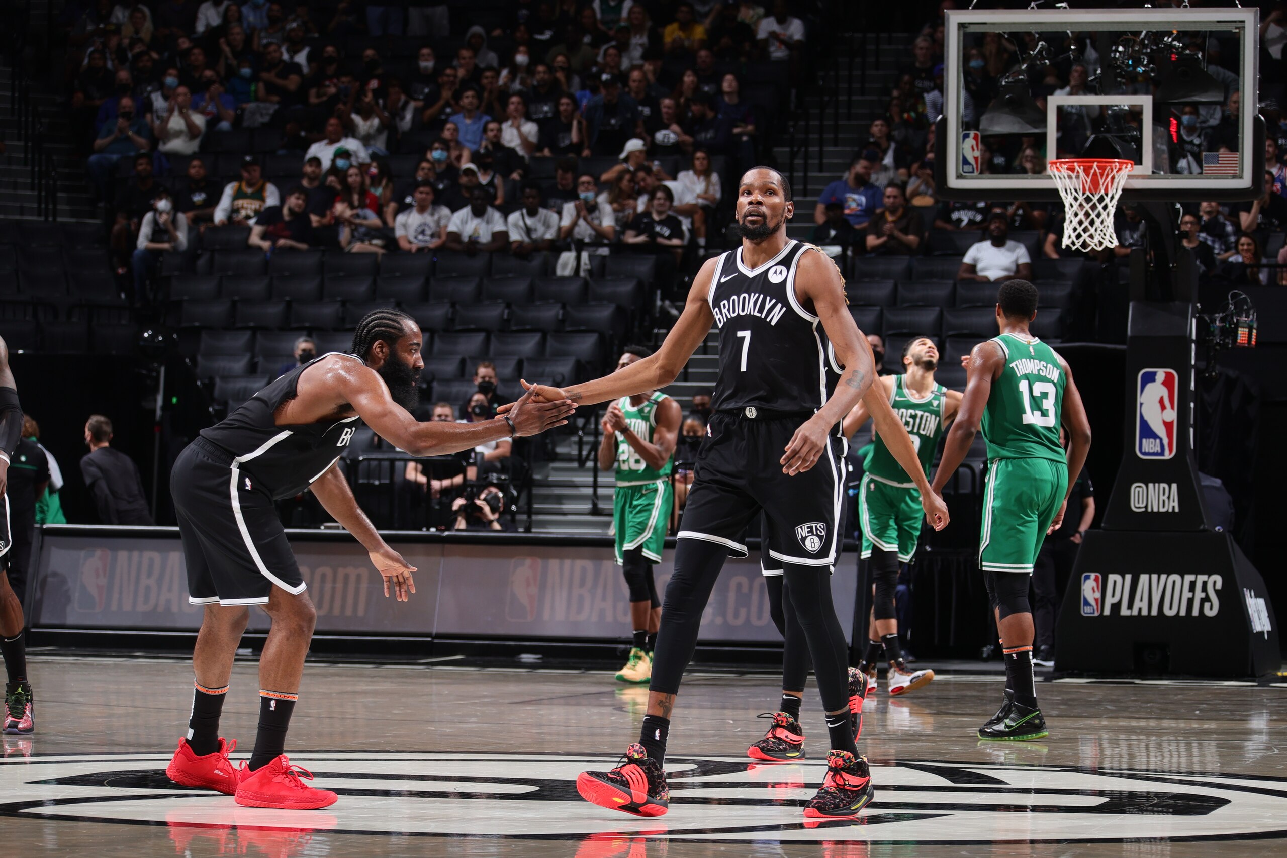 BROOKLYN, NY - MAY 22: James Harden #13 and Kevin Durant #7 of the Brooklyn Nets high five during Round 1, Game 1 of the 2021 NBA Playoffs on May 22, 2021 at Barclays Center in Brooklyn, New York. NOTE TO USER: User expressly acknowledges and agrees that, by downloading and or using this Photograph, user is consenting to the terms and conditions of the Getty Images License Agreement. Mandatory Copyright Notice: Copyright 2021 NBAE (Photo by Nathaniel S. Butler/NBAE via Getty Images) BROOKLYN, NY - MAY 22: James Harden #13 and Kevin Durant #7 of the Brooklyn Nets high five during Round 1, Game 1 of the 2021 NBA Playoffs on May 22, 2021 at Barclays Center in Brooklyn, New York. NOTE TO USER: User expressly acknowledges and agrees that, by downloading and or using this Photograph, user is consenting to the terms and conditions of the Getty Images License Agreement. Mandatory Copyright Notice: Copyright 2021 NBAE (Photo by Nathaniel S. Butler/NBAE via Getty Images)