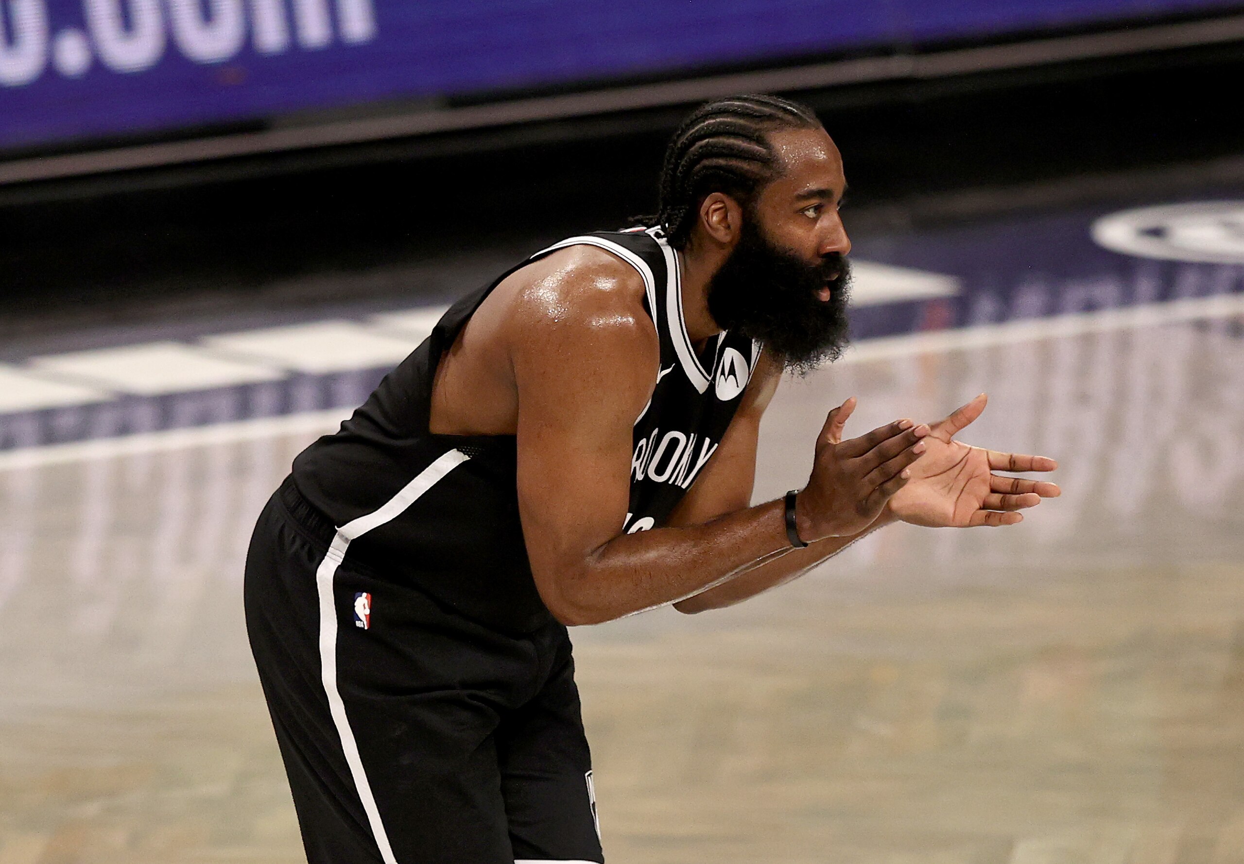 NEW YORK, NEW YORK - MAY 22: James Harden #13 of the Brooklyn Nets encourages his teammates in the second quarter against the Boston Celtics during Game One of their Eastern Conference first-round playoff series on May 22, 2021 at Barclays Center in the Brooklyn borough of New York City. NOTE TO USER: User expressly acknowledges and agrees that, by downloading and or using this photograph, User is consenting to the terms and conditions of the Getty Images License Agreement. (Photo by Elsa/Getty Images)
