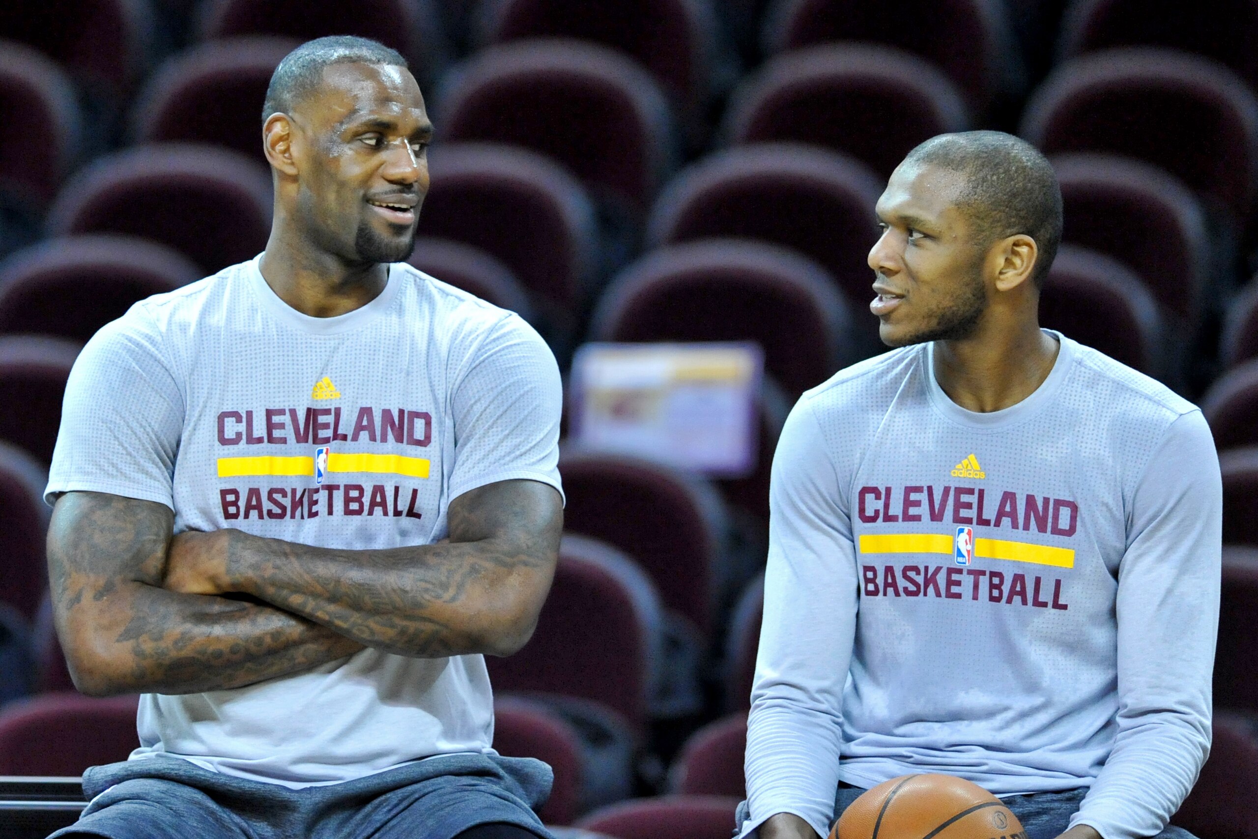 CLEVELAND, OH - FEBRUARY 18, 2016: LeBron James (L) and James Jones of the Cleveland Cavaliers talk prior to a game against the Chicago Bulls at Quicken Loans Arena on February 18, 2016 in Cleveland, Ohio. Cleveland won 106-95. (Photo by: 2016 Nick Cammett/Diamond Images via Getty Images)