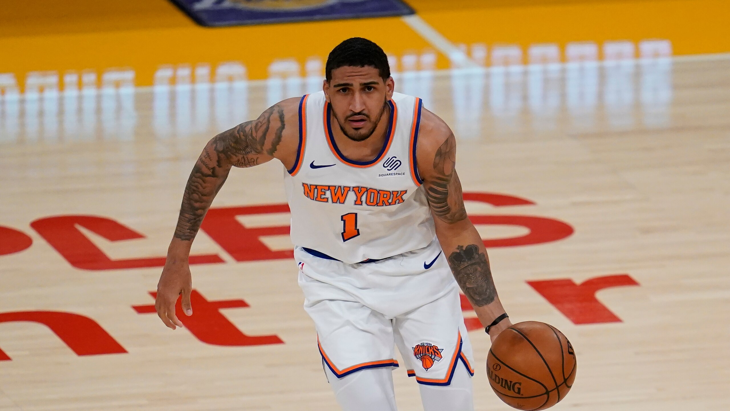 New York Knicks forward Obi Toppin (1) controls the ball during an NBA basketball game against the Los Angeles Lakers Tuesday, May 11, 2021, in Los Angeles. (AP Photo/Ashley Landis) New York Knicks forward Obi Toppin (1) controls the ball during an NBA basketball game against the Los Angeles Lakers Tuesday, May 11, 2021, in Los Angeles. (AP Photo/Ashley Landis)