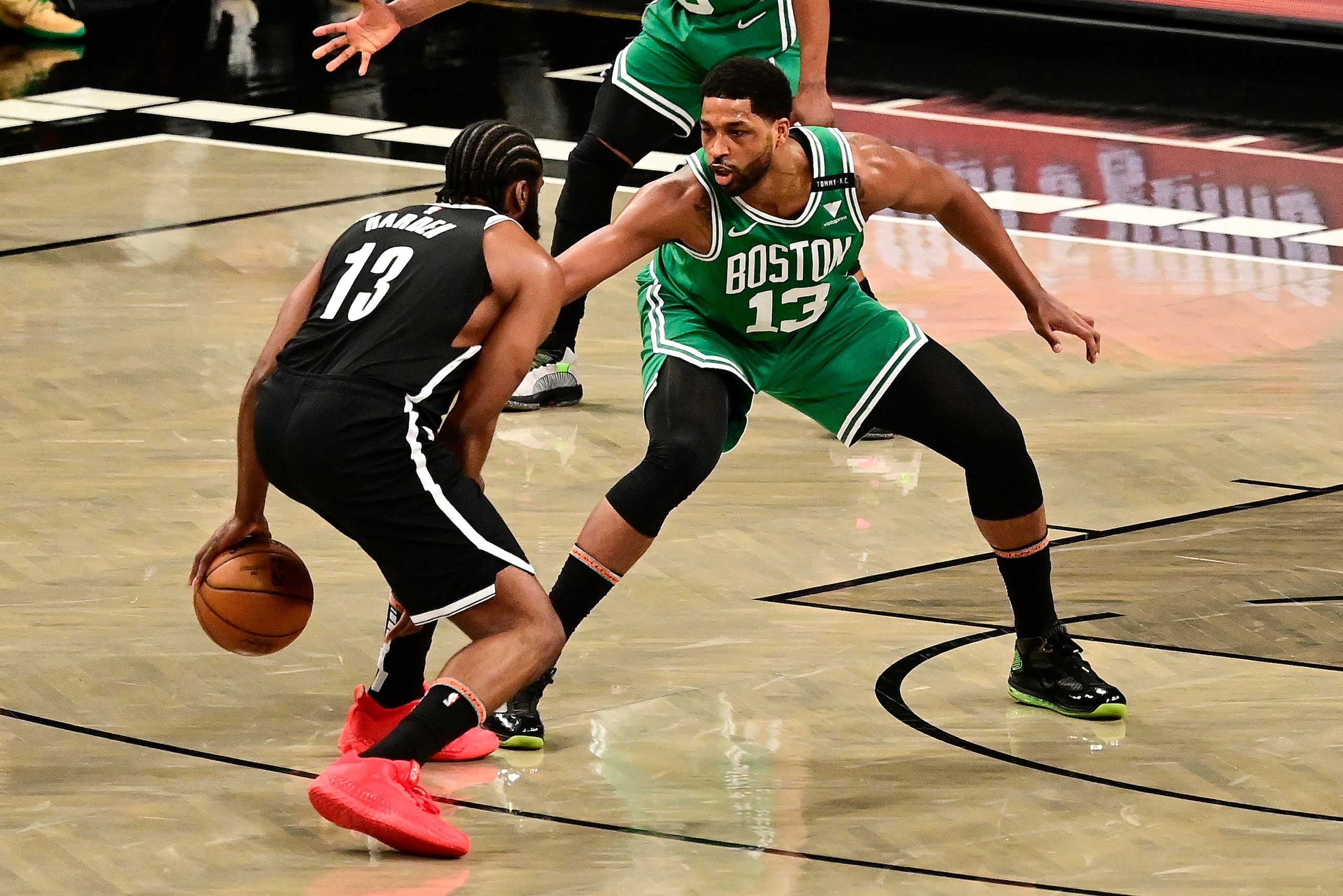 NEW YORK, NEW YORK - MAY 22:  Tristan Thompson #13 of the Boston Celtics defends James Harden #13 of the Brooklyn Nets in Game One of the First Round of the 2021 NBA Playoffs at Barclays Center at Barclays Center on May 22, 2021 in New York City. NOTE TO USER: User expressly acknowledges and agrees that, by downloading and or using this photograph, User is consenting to the terms and conditions of the Getty Images License Agreement.  (Photo by Steven Ryan/Getty Images)