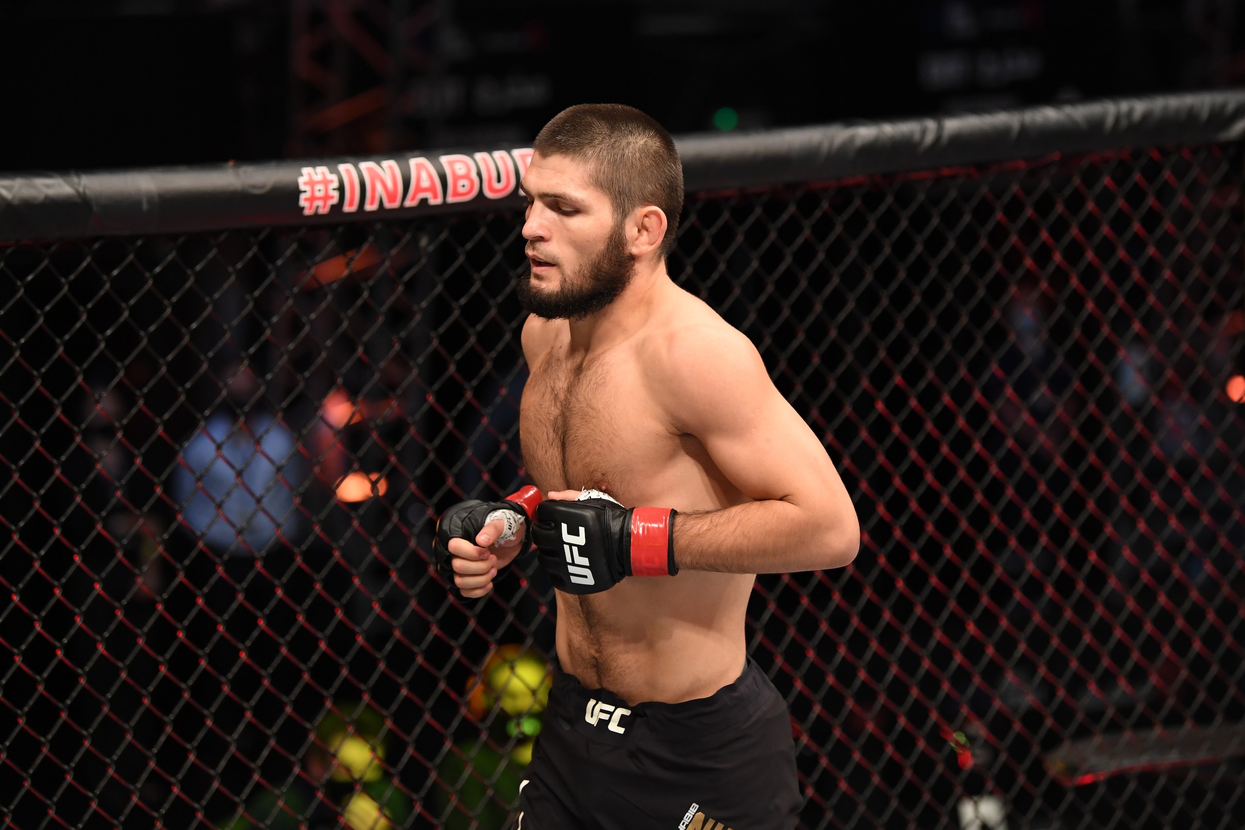 ABU DHABI, UNITED ARAB EMIRATES - OCTOBER 25:  Khabib Nurmagomedov of Russia enters the Octagon prior to his lightweight title bout against Justin Gaethje during the UFC 254 event on October 25, 2020 on UFC Fight Island, Abu Dhabi, United Arab Emirates. (Photo by Josh Hedges/Zuffa LLC via Getty Images)