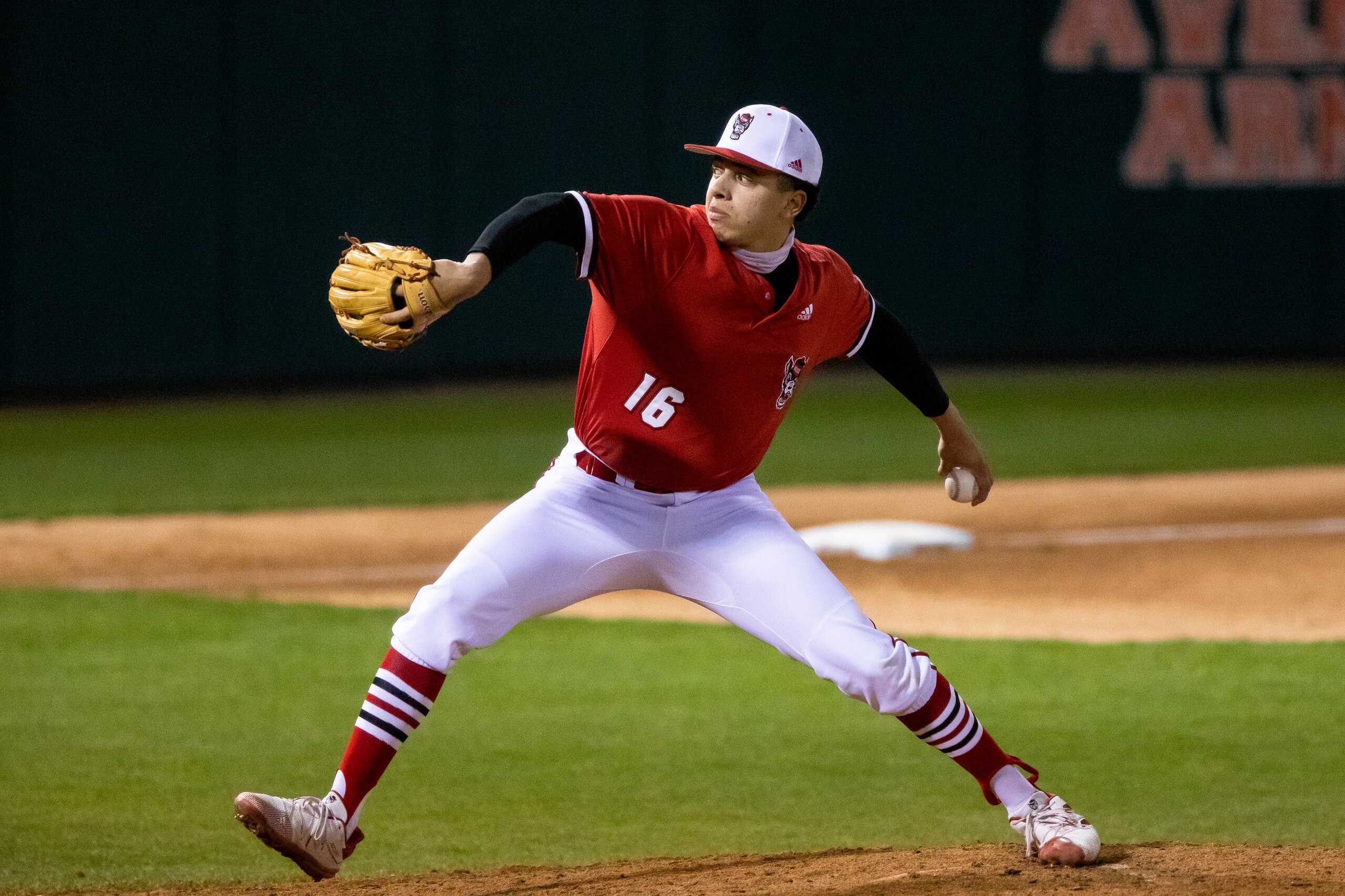 North Carolina State's Chris Villaman (16) pitches during an NCAA baseball game on Friday, March 19, 2021, in Raleigh, N.C. (AP Photo/Ben McKeown)