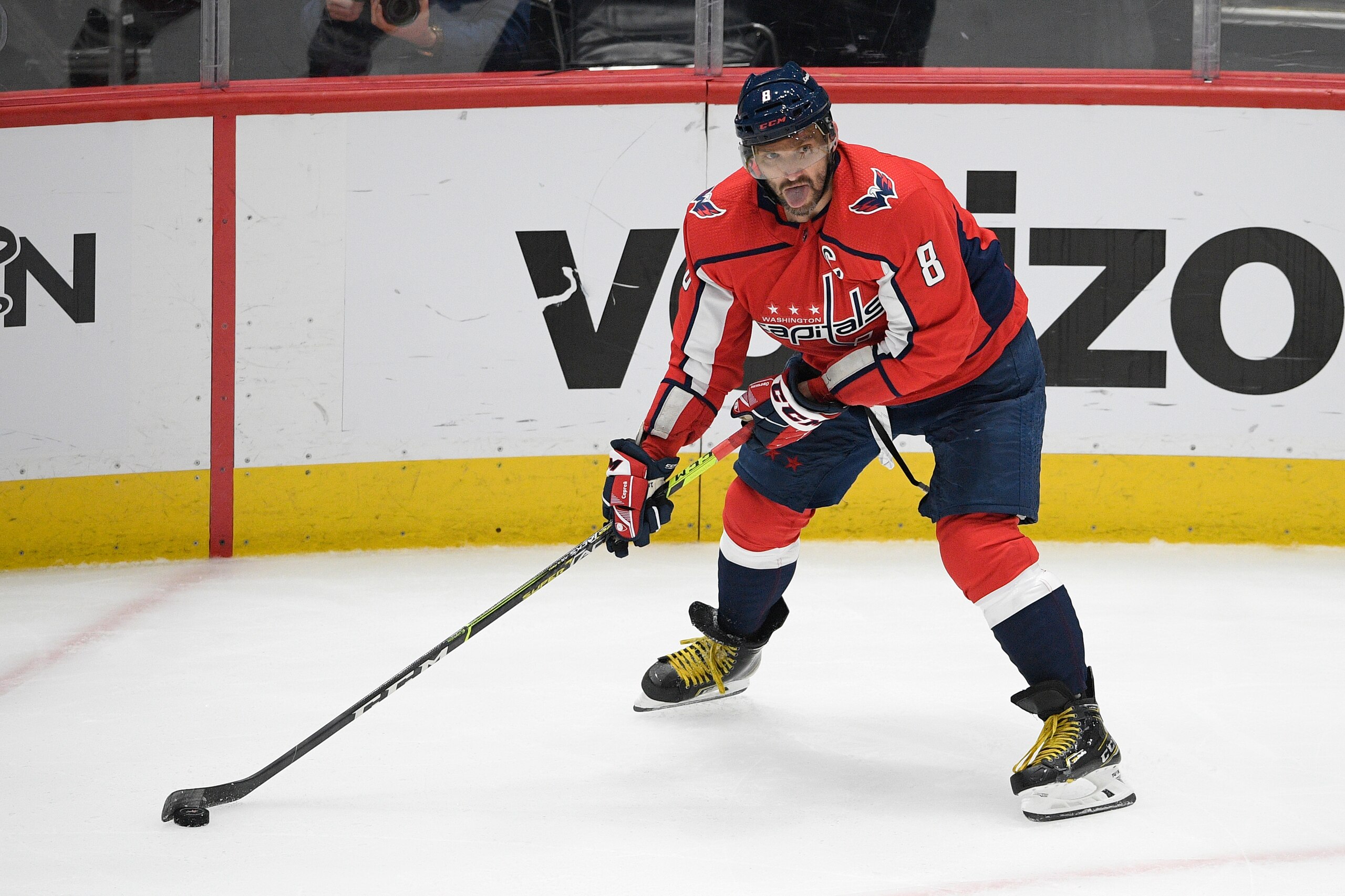 Washington Capitals left wing Alex Ovechkin (8) skates with the puck during the second period in Game 5 of an NHL hockey Stanley Cup first-round playoff series against the Boston Bruins, Sunday, May 23, 2021, in Washington. (AP Photo/Nick Wass)