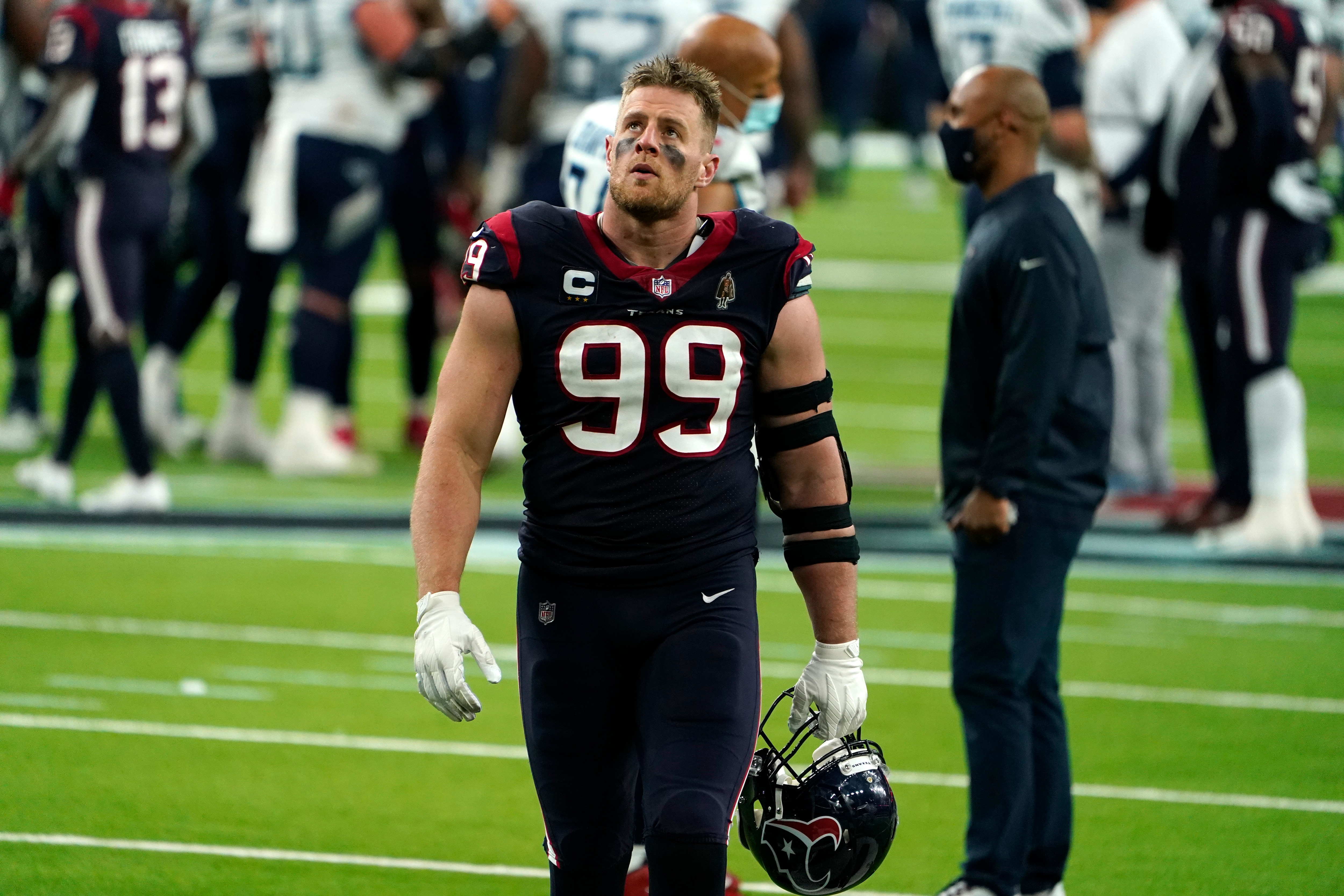 Houston Texans defensive end J.J. Watt (99) walks off the field after an NFL football game against the Tennessee Titans Sunday, Jan. 3, 2021, in Houston. The Titans won 41-38. (AP Photo/Eric Christian Smith)