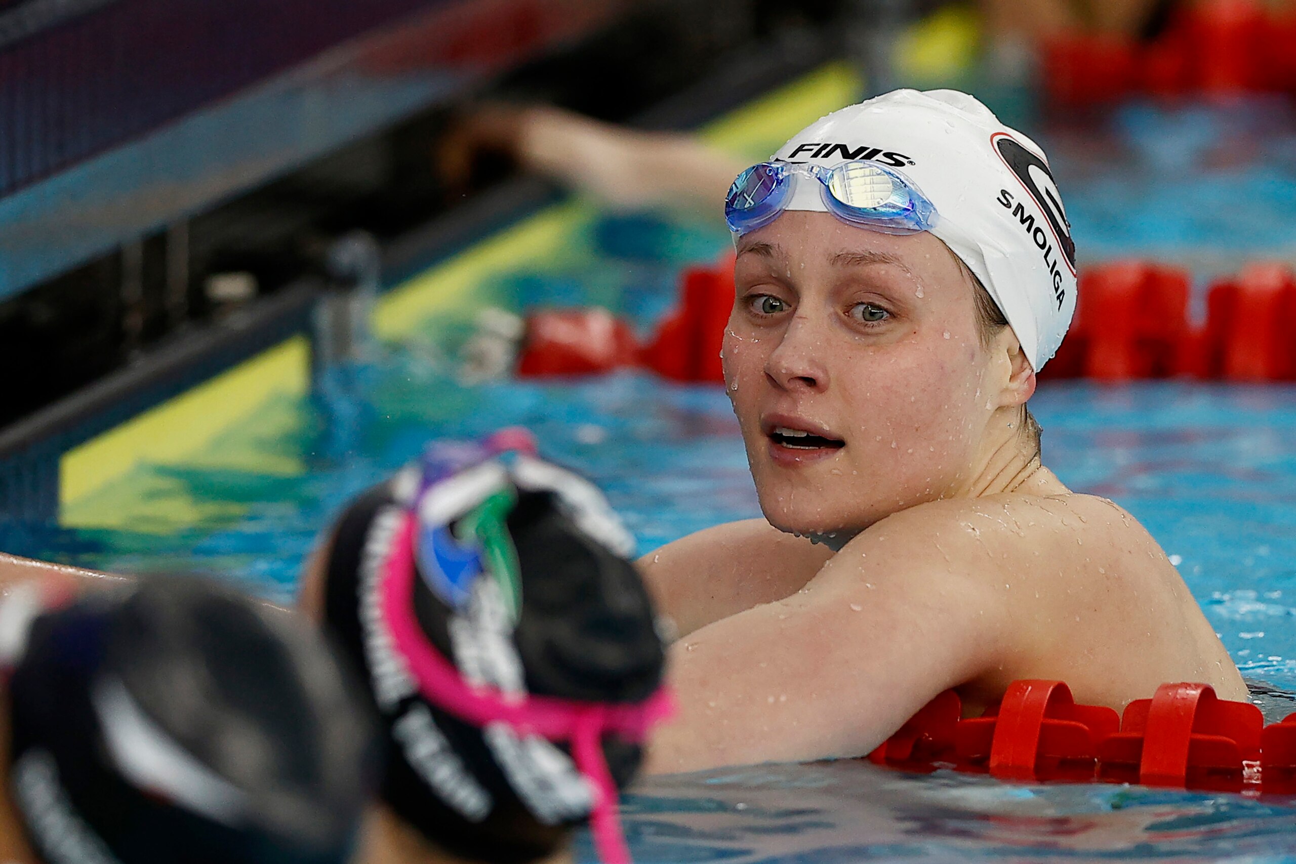 SAN ANTONIO, TEXAS - MARCH 06: Olivia Smoliga talks with Regan Smith after competing in the Women's 100 Meter Backstroke Final on Day Four of the TYR Pro Swim Series at San Antonio on March 06, 2021 in San Antonio, Texas. (Photo by Maddie Meyer/Getty Images)