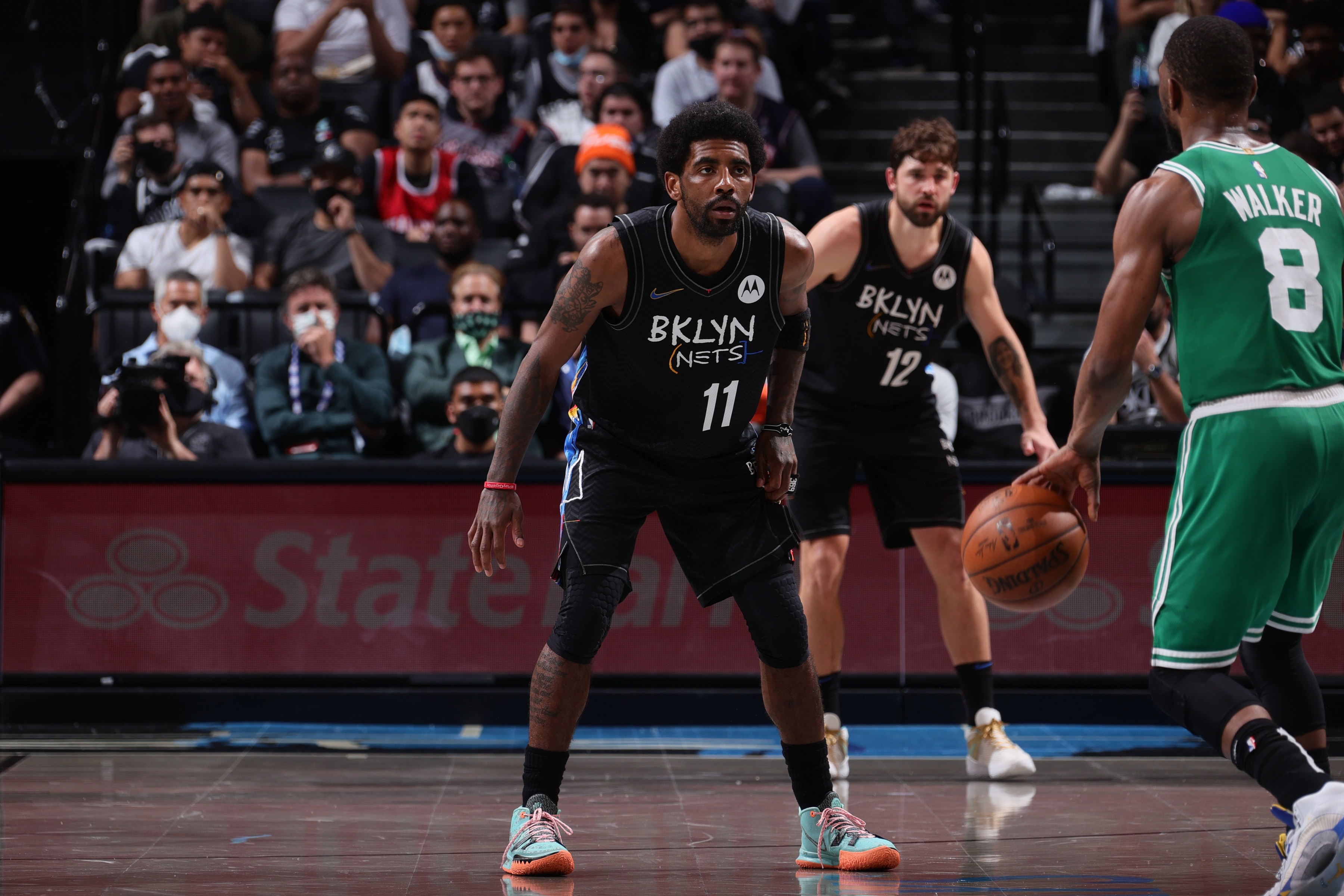 BROOKLYN, NY - MAY 25: Kyrie Irving #11 of the Brooklyn Nets plays defense on Kemba Walker #8 of the Boston Celtics during Round 1, Game 2 of the 2021 NBA Playoffs on May 25, 2021 at Barclays Center in Brooklyn, New York. NOTE TO USER: User expressly acknowledges and agrees that, by downloading and or using this Photograph, user is consenting to the terms and conditions of the Getty Images License Agreement. Mandatory Copyright Notice: Copyright 2021 NBAE (Photo by Nathaniel S. Butler/NBAE via Getty Images)