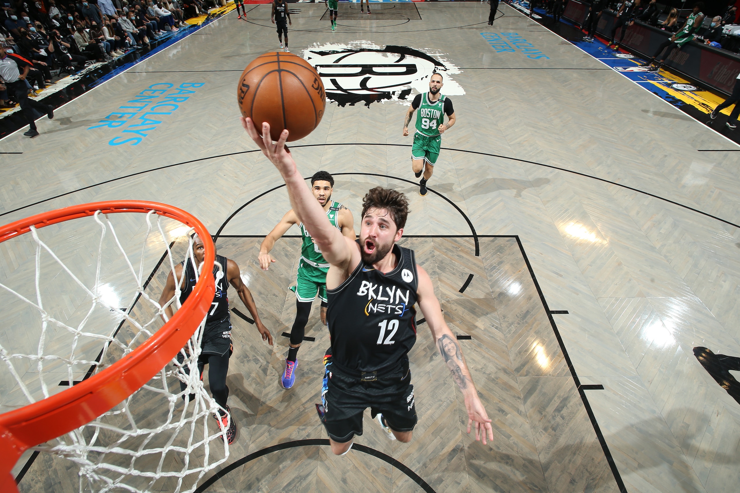 BROOKLYN, NY - MAY 25: Joe Harris #12 of the Brooklyn Nets drives to the basket against the Boston Celtics during Round 1, Game 2 of the 2021 NBA Playoffs on May 25, 2021 at Barclays Center in Brooklyn, New York. NOTE TO USER: User expressly acknowledges and agrees that, by downloading and or using this Photograph, user is consenting to the terms and conditions of the Getty Images License Agreement. Mandatory Copyright Notice: Copyright 2021 NBAE (Photo by Nathaniel S. Butler/NBAE via Getty Images)