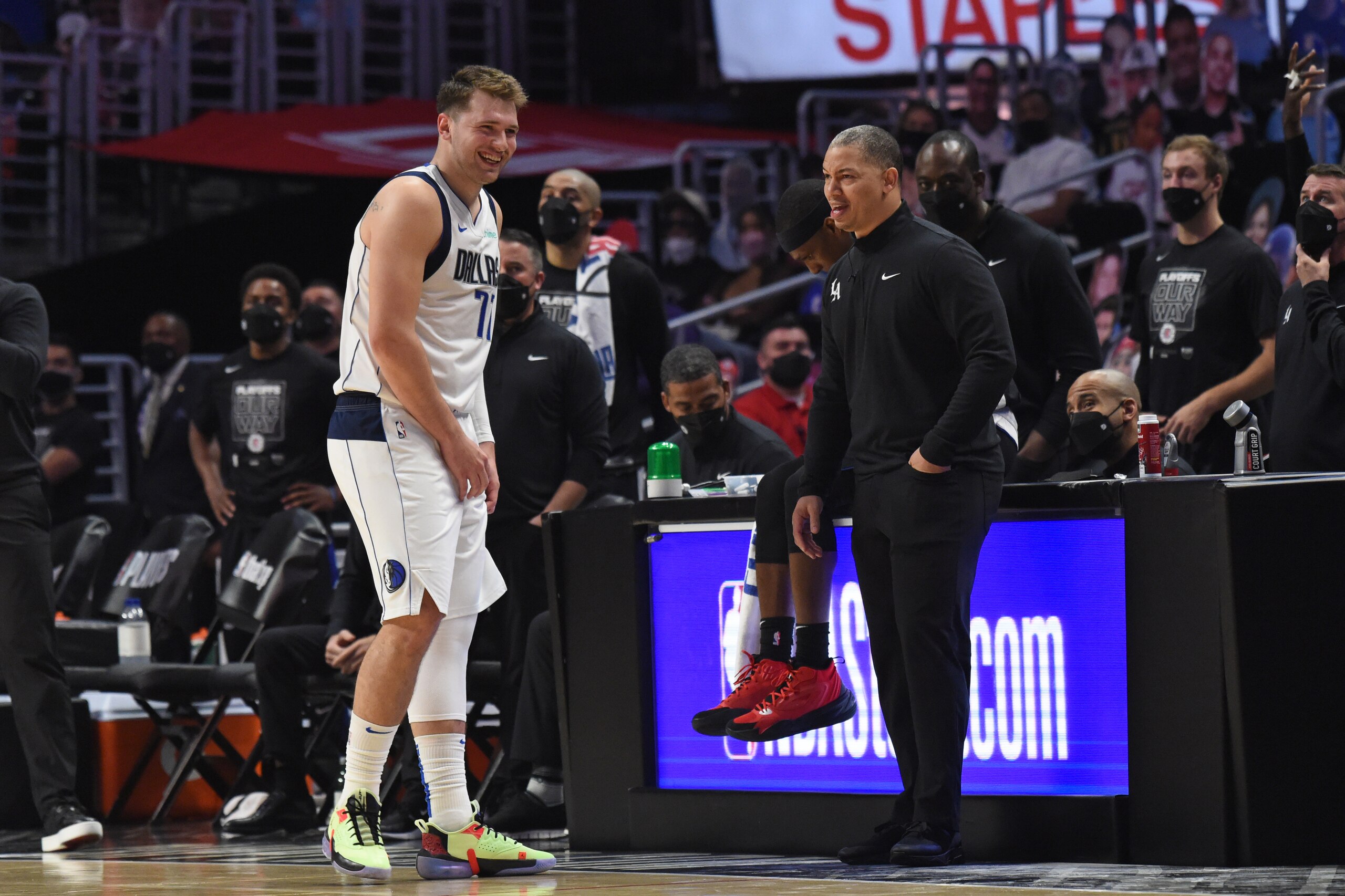 LOS ANGELES, CA - MAY 22: Luka Doncic #77 of the Dallas Mavericks and Head Coach, Tyronn Lue of the Los Angeles Clippers share a moment during Round 1, Game 1 of the the 2021 NBA Playoffs on May 22, 2021 at STAPLES Center in Los Angeles, California. NOTE TO USER: User expressly acknowledges and agrees that, by downloading and/or using this Photograph, user is consenting to the terms and conditions of the Getty Images License Agreement. Mandatory Copyright Notice: Copyright 2021 NBAE (Photo by Juan Ocampo/NBAE via Getty Images) LOS ANGELES, CA - MAY 22: Luka Doncic #77 of the Dallas Mavericks and Head Coach, Tyronn Lue of the Los Angeles Clippers share a moment during Round 1, Game 1 of the the 2021 NBA Playoffs on May 22, 2021 at STAPLES Center in Los Angeles, California. NOTE TO USER: User expressly acknowledges and agrees that, by downloading and/or using this Photograph, user is consenting to the terms and conditions of the Getty Images License Agreement. Mandatory Copyright Notice: Copyright 2021 NBAE (Photo by Juan Ocampo/NBAE via Getty Images)