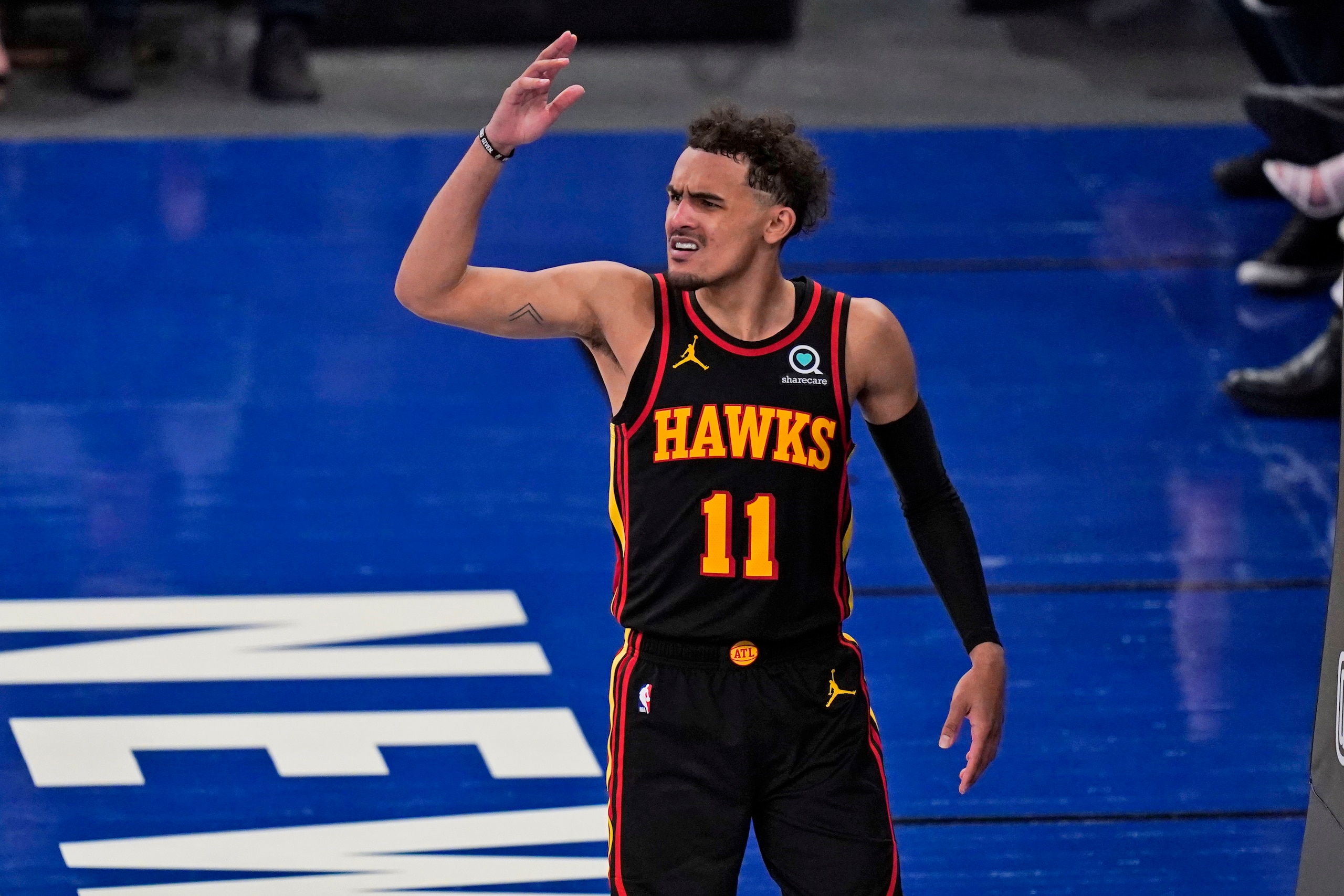Atlanta Hawks' Trae Young reacts during the second half of Game 1 of an NBA basketball first-round playoff series against the New York Knicks, Sunday, May 23, 2021, in New York. (AP Photo/Seth Wenig, Pool)
