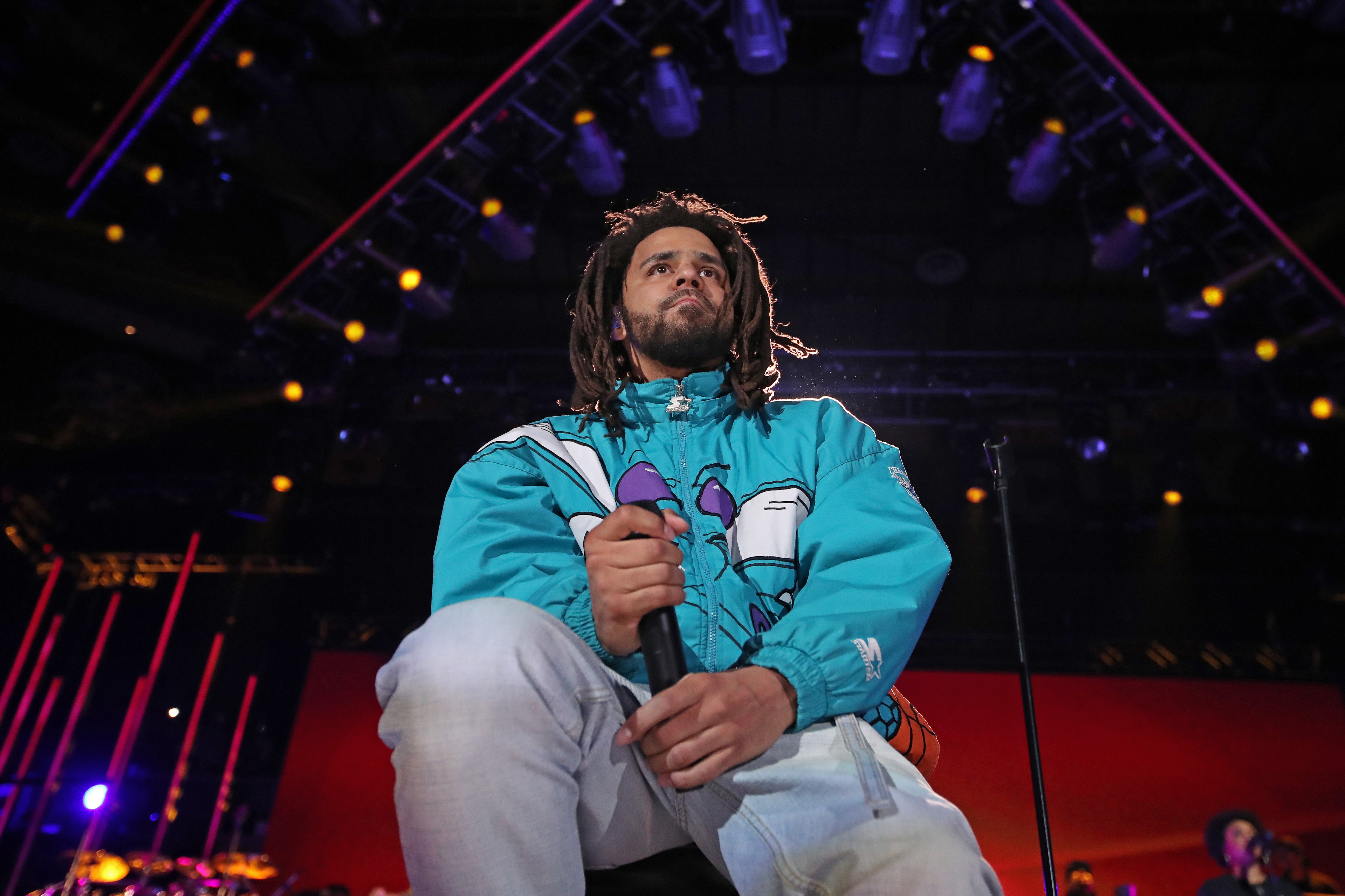 CHARLOTTE, NC - FEBRUARY 17: Rapper, J. Cole, performs during the 2019 NBA All-Star Game on February 17, 2019 at the Spectrum Center in Charlotte, North Carolina. NOTE TO USER: User expressly acknowledges and agrees that, by downloading and/or using this photograph, user is consenting to the terms and conditions of the Getty Images License Agreement. Mandatory Copyright Notice: Copyright 2019 NBAE (Photo by Issac Baldizon/NBAE via Getty Images)