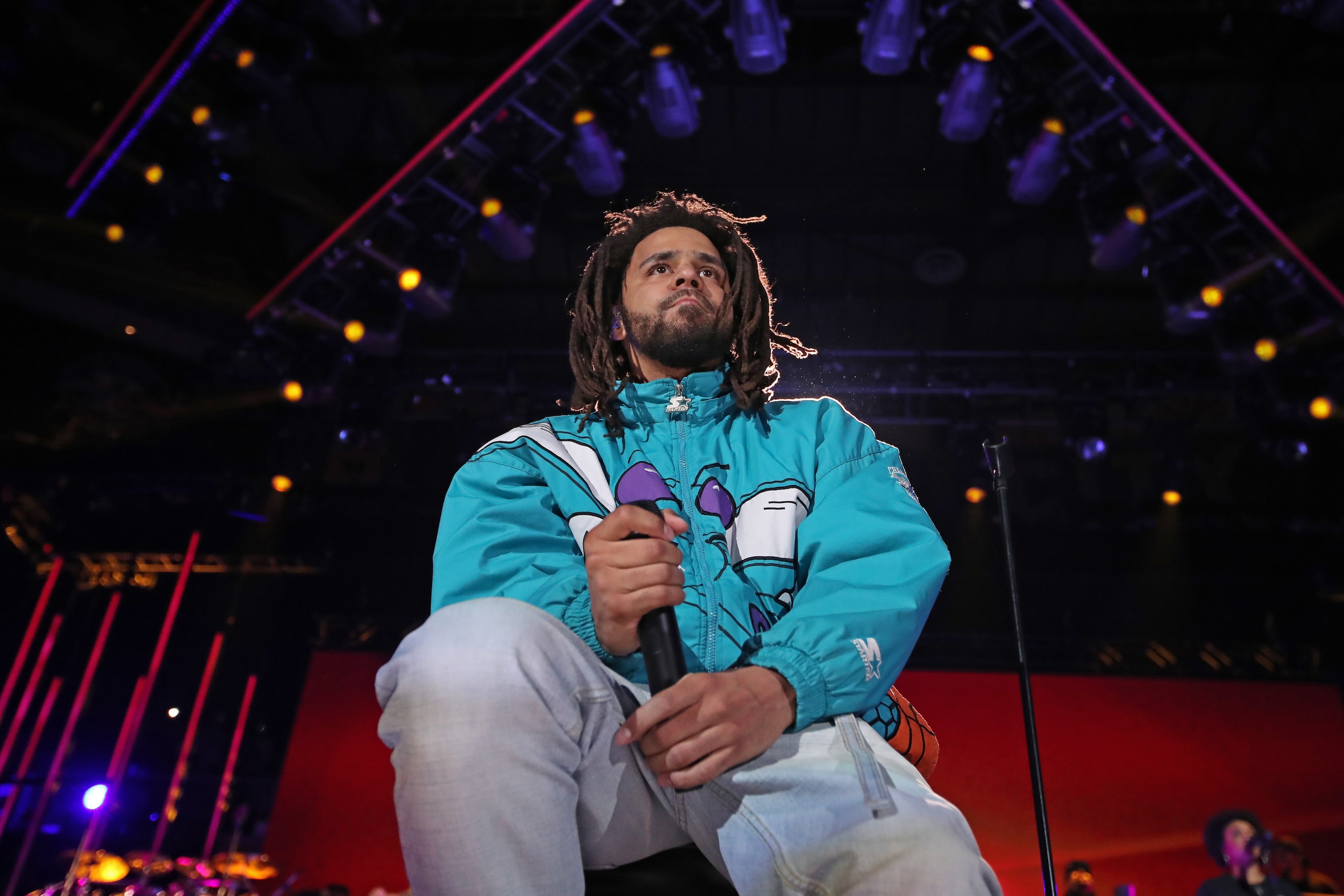 CHARLOTTE, NC - FEBRUARY 17: Rapper, J. Cole, performs during the 2019 NBA All-Star Game on February 17, 2019 at the Spectrum Center in Charlotte, North Carolina. NOTE TO USER: User expressly acknowledges and agrees that, by downloading and/or using this photograph, user is consenting to the terms and conditions of the Getty Images License Agreement. Mandatory Copyright Notice: Copyright 2019 NBAE (Photo by Issac Baldizon/NBAE via Getty Images)