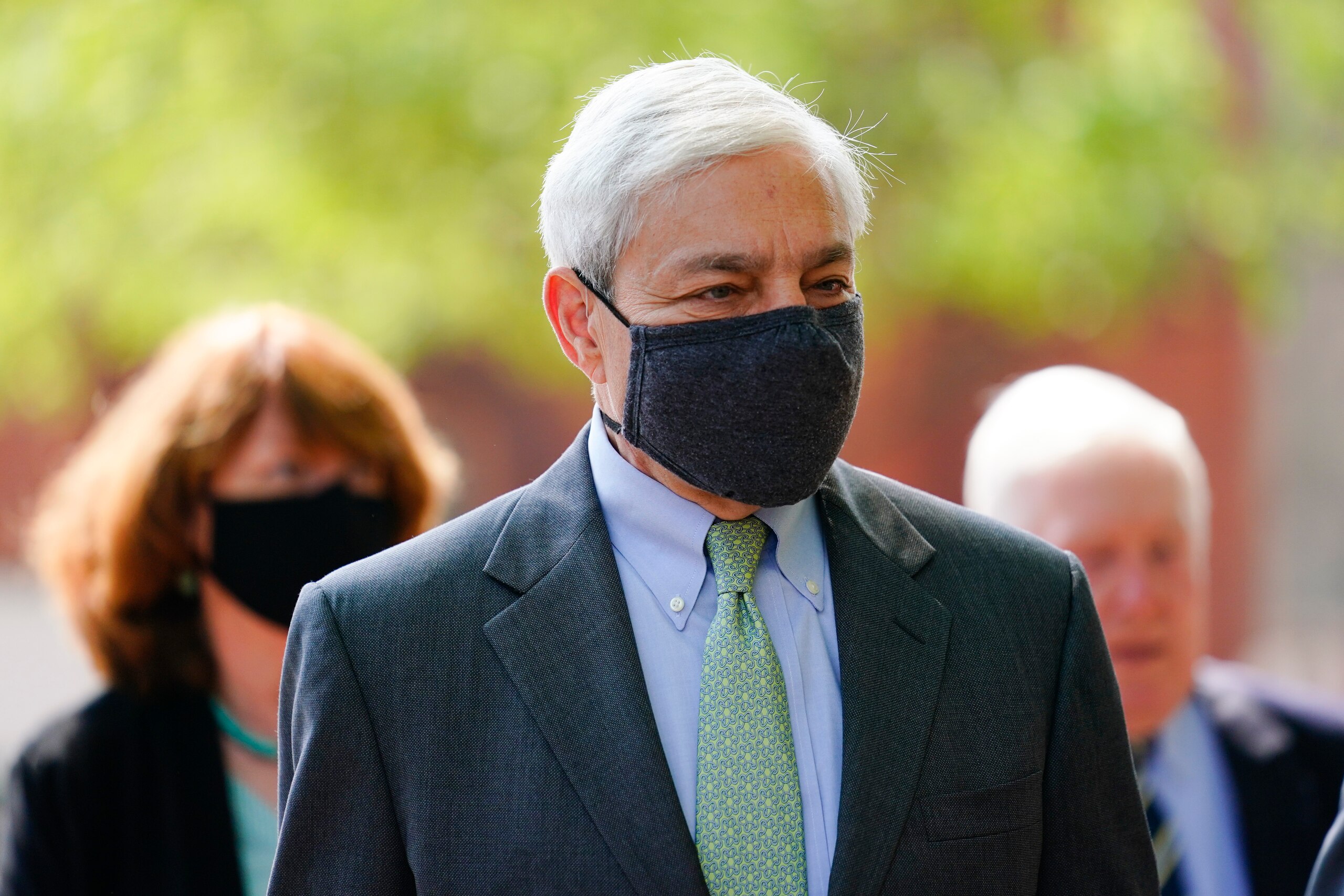 Former Penn State President Graham Spanier walks from the Dauphin County Courthouse in Harrisburg, Pa., after a hearing at Wednesday, May 26, 2021. A judge has upheld the jail sentence of Spanier who was forced out as the school's top administrator after Jerry Sandusky was arrested nearly a decade ago. The judge said Spanier must report to jail on July 9 to begin serving at least two months for endangering the welfare of children, followed by two months of house arrest. (AP Photo/Matt Rourke)