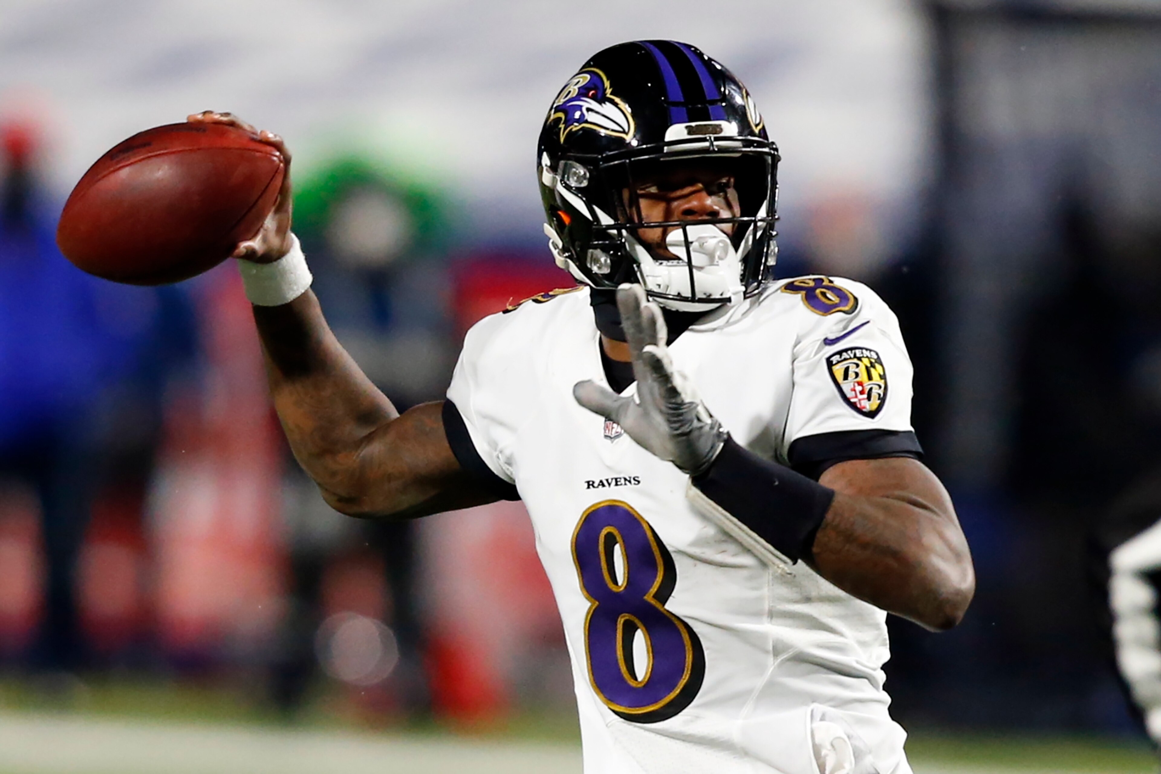 Baltimore Ravens quarterback Lamar Jackson (8) throws a pass for an interception during the second half of an NFL divisional round football game against the Buffalo Bills Saturday, Jan. 16, 2021, in Orchard Park, N.Y. The Bills won 17-3. (AP Photo/Jeffrey T. Barnes)