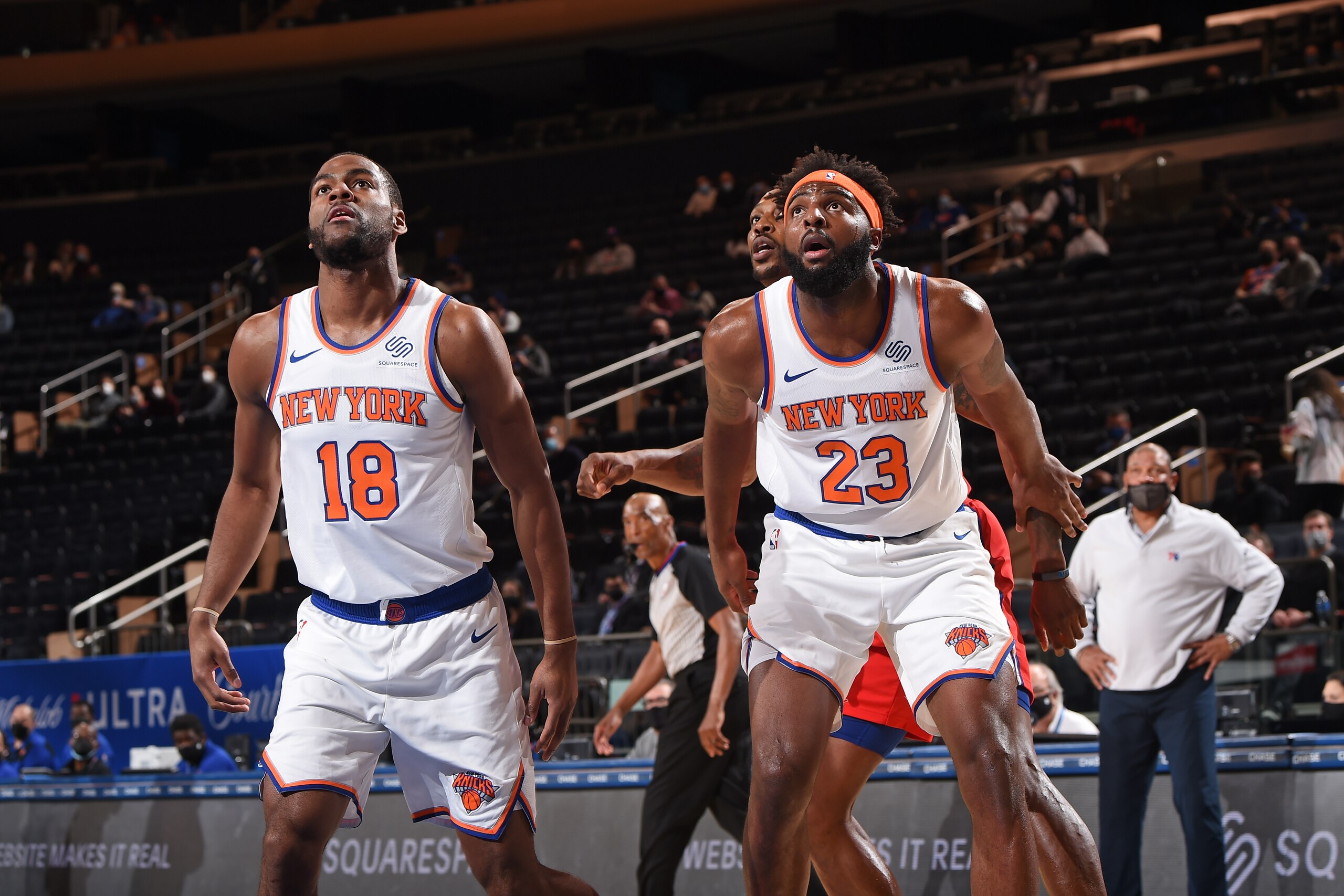 NEW YORK, NY - MARCH 21: Alec Burks #18 of the New York Knicks and Mitchell Robinson #23 of the New York Knicks look to rebound on March 21, 2021 at Madison Square Garden in New York City, New York. NOTE TO USER: User expressly acknowledges and agrees that, by downloading and/or using this Photograph, user is consenting to the terms and conditions of the Getty Images License Agreement. Mandatory Copyright Notice: Copyright 2021 NBAE (Photo by David Dow/NBAE via Getty Images)