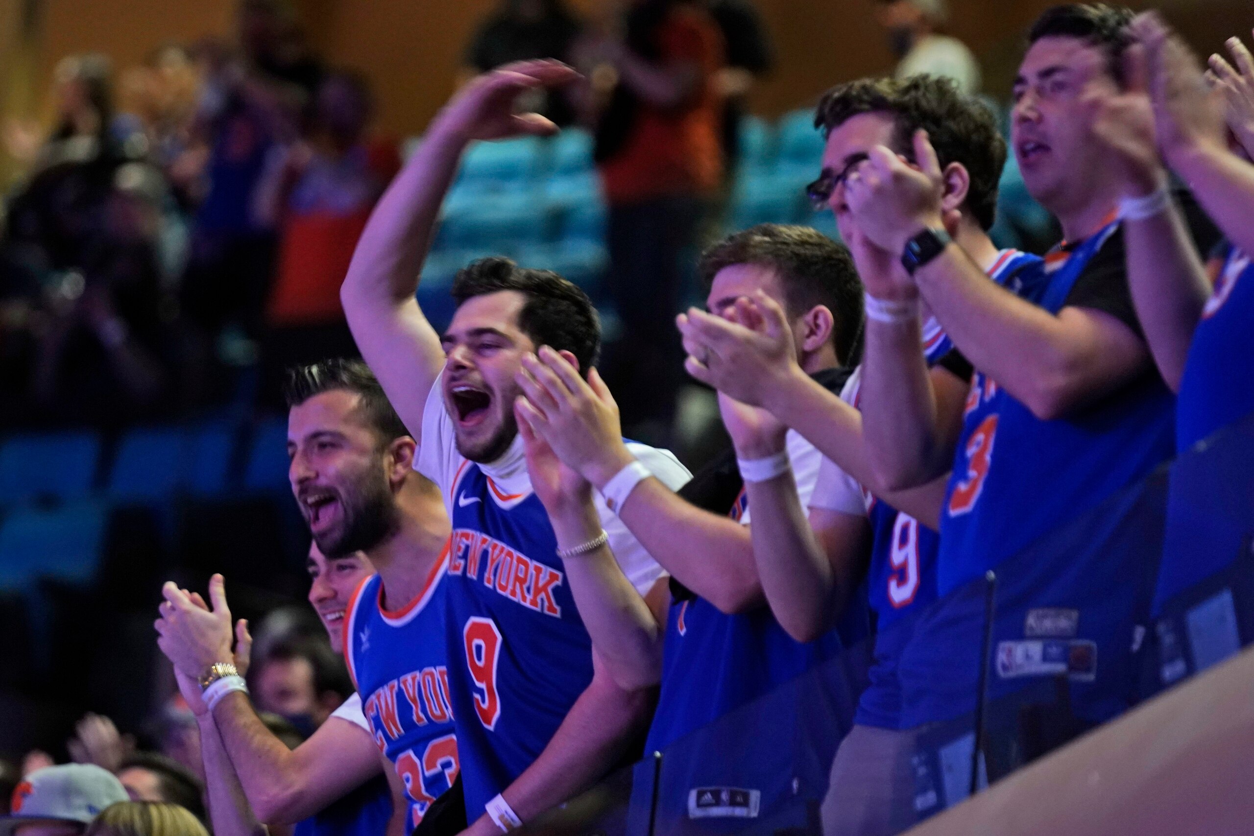NEW YORK, NY - MAY 23: New York Knicks fans cheer before Game 1 of an NBA basketball first-round playoff series against the Atlanta Hawks on May 23, 2021 in New York City. NOTE TO USER: User expressly acknowledges and agrees that,  by downloading and or using this photograph,  User is consenting to the terms and conditions of the Getty Images License Agreement. (Photo by Seth Wenig - Pool/Getty Images)